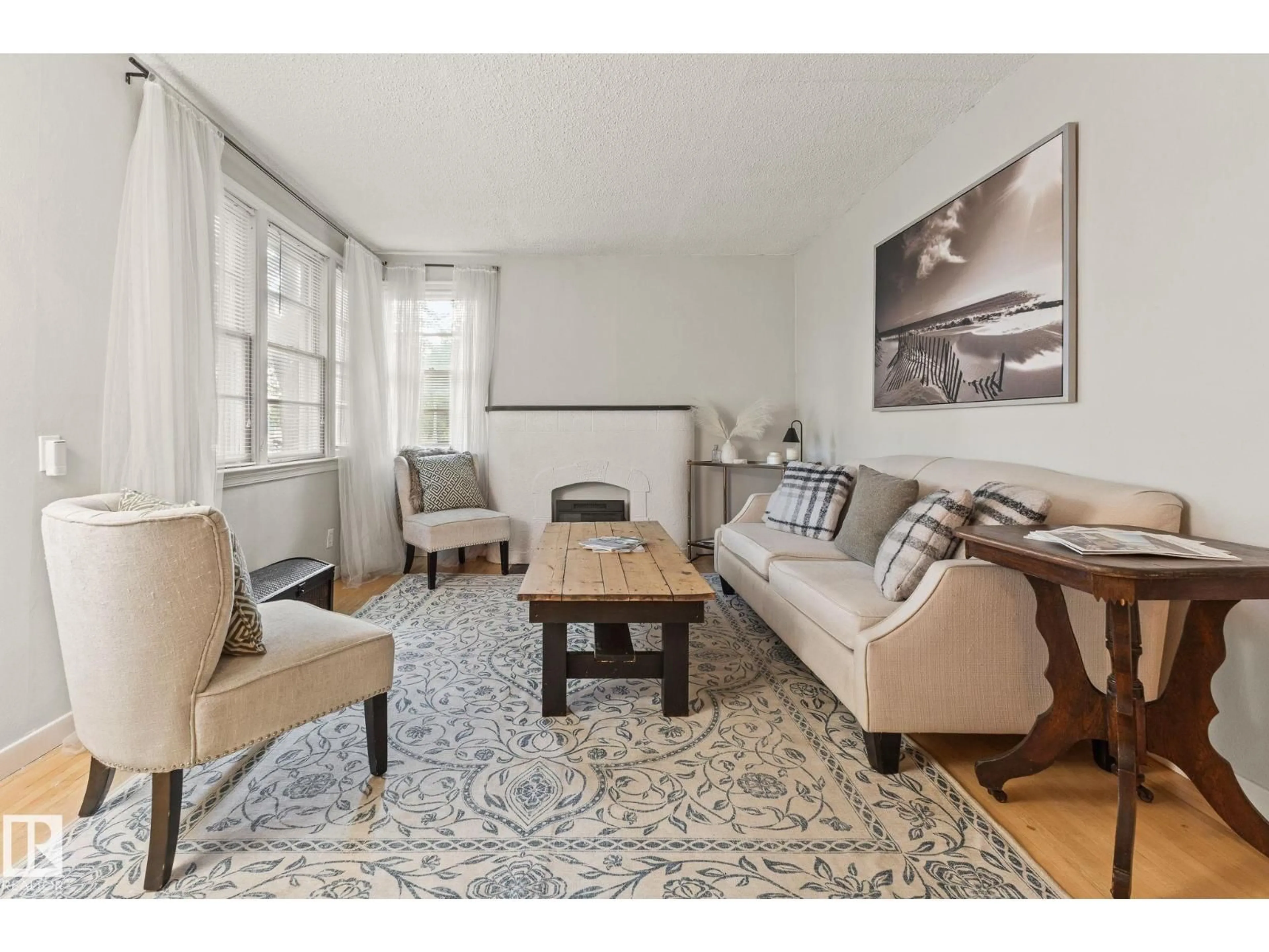 Living room with furniture, unknown for NW - 12034 104 ST, Edmonton Alberta T5G2L4