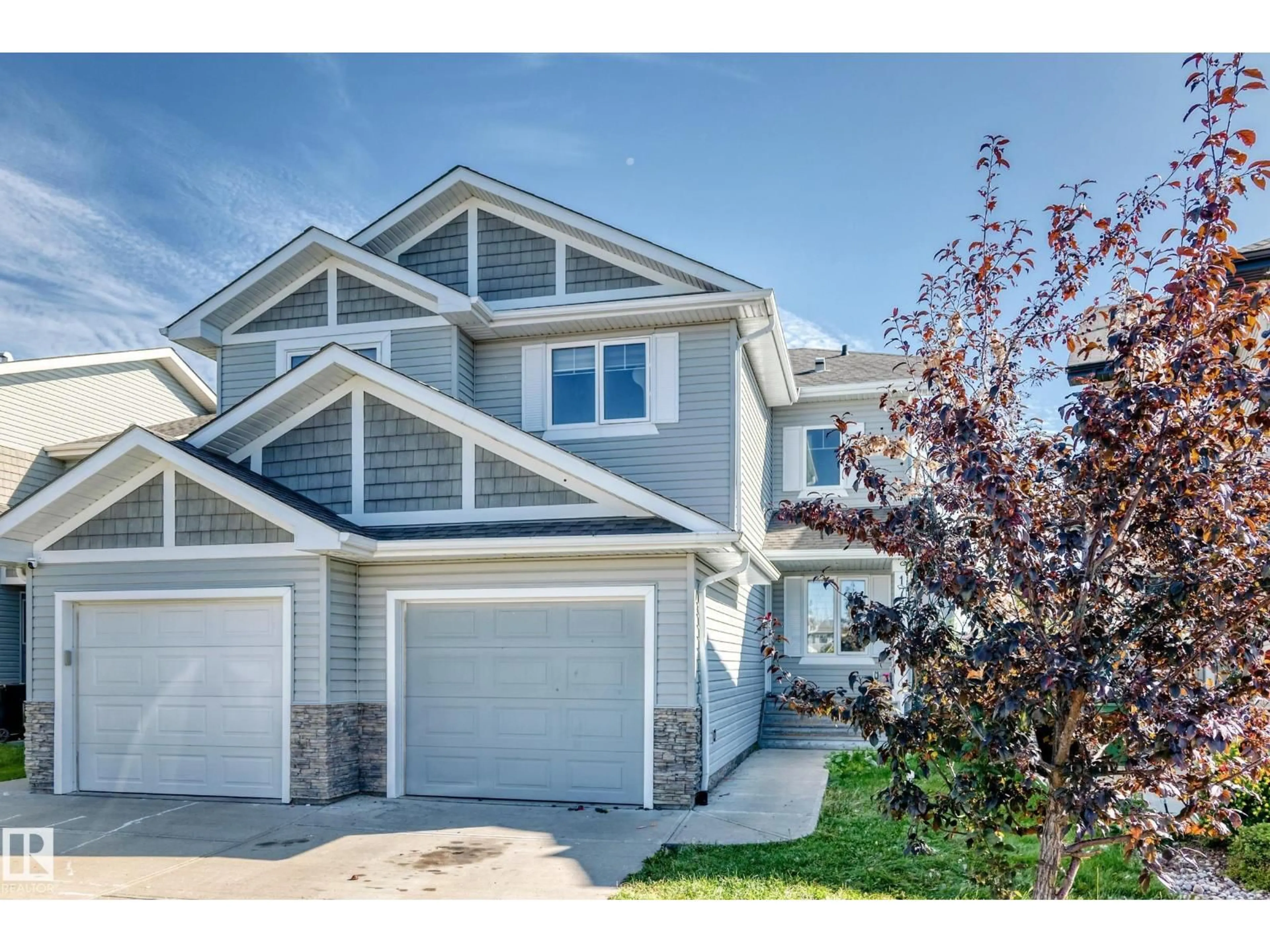 Home with vinyl exterior material, street for NW - 17311 120 ST, Edmonton Alberta T5X0J6