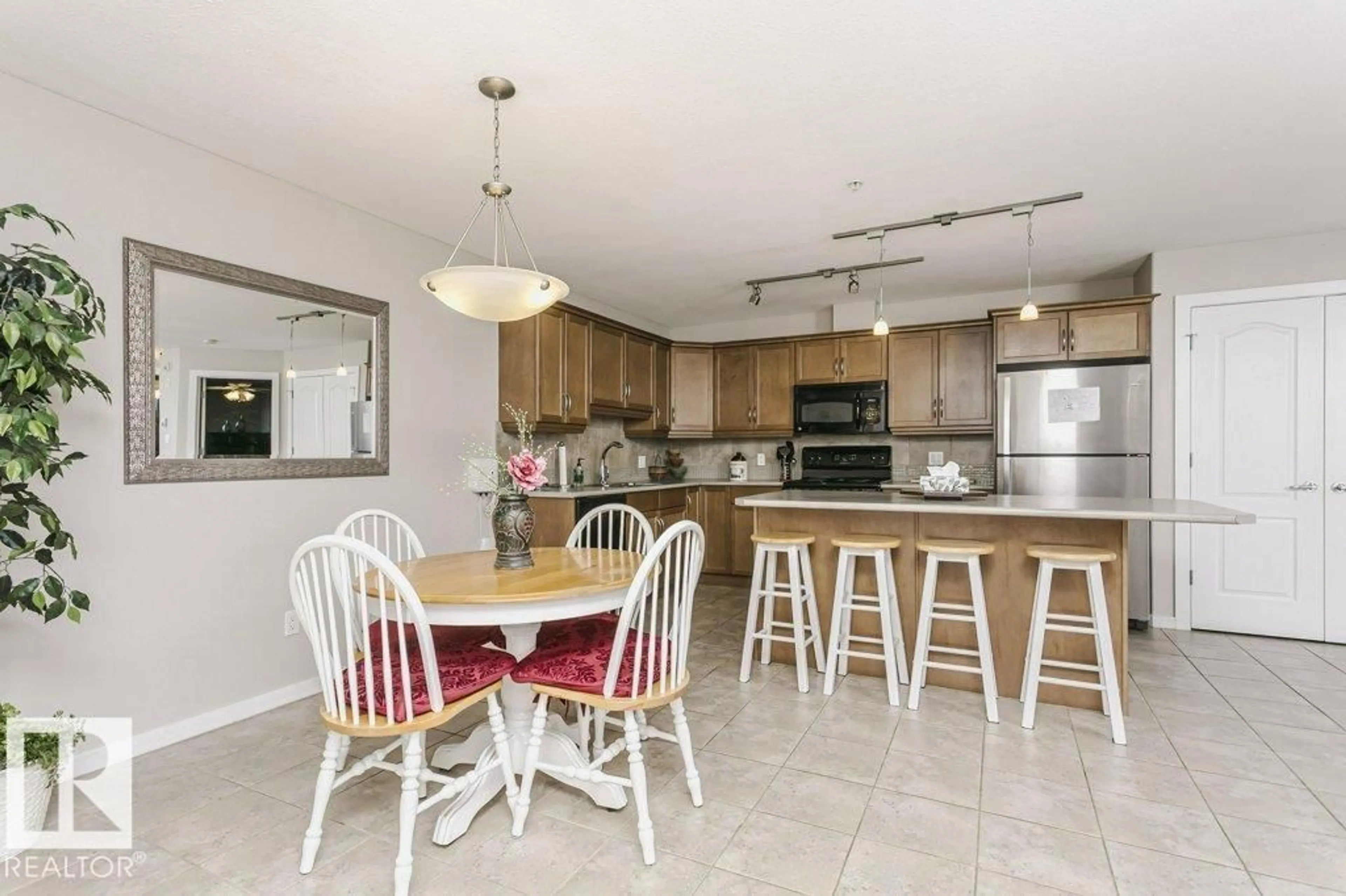 Open concept kitchen, ceramic/tile floor for NW - 325 278 SUDER GREENS DR, Edmonton Alberta T5T6V6