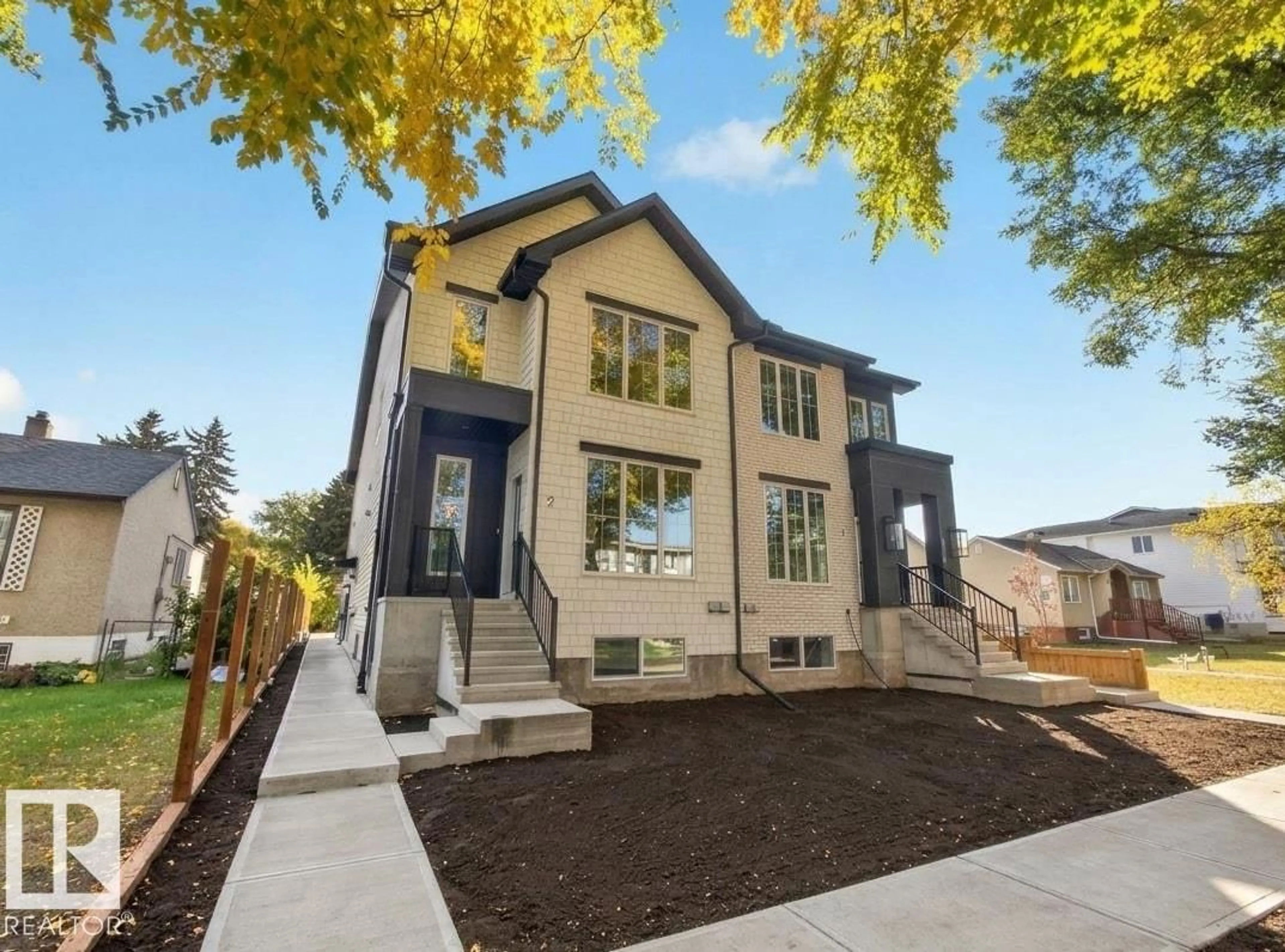 Home with brick exterior material, street for 10985 130 ST, Edmonton Alberta T5M0Z6