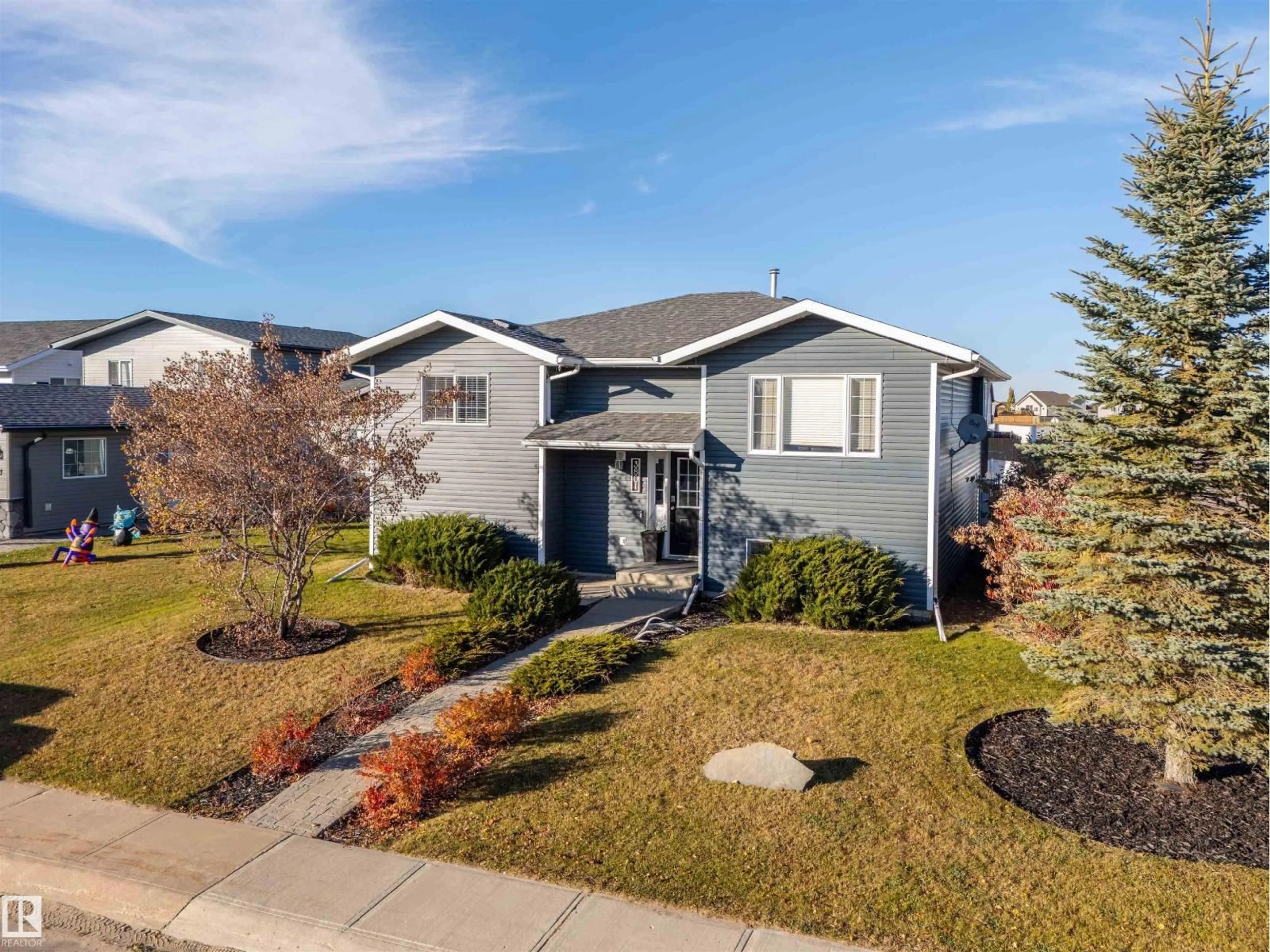 Home with vinyl exterior material, street for 3801 42 AVE, Bonnyville Town Alberta T9N2P4