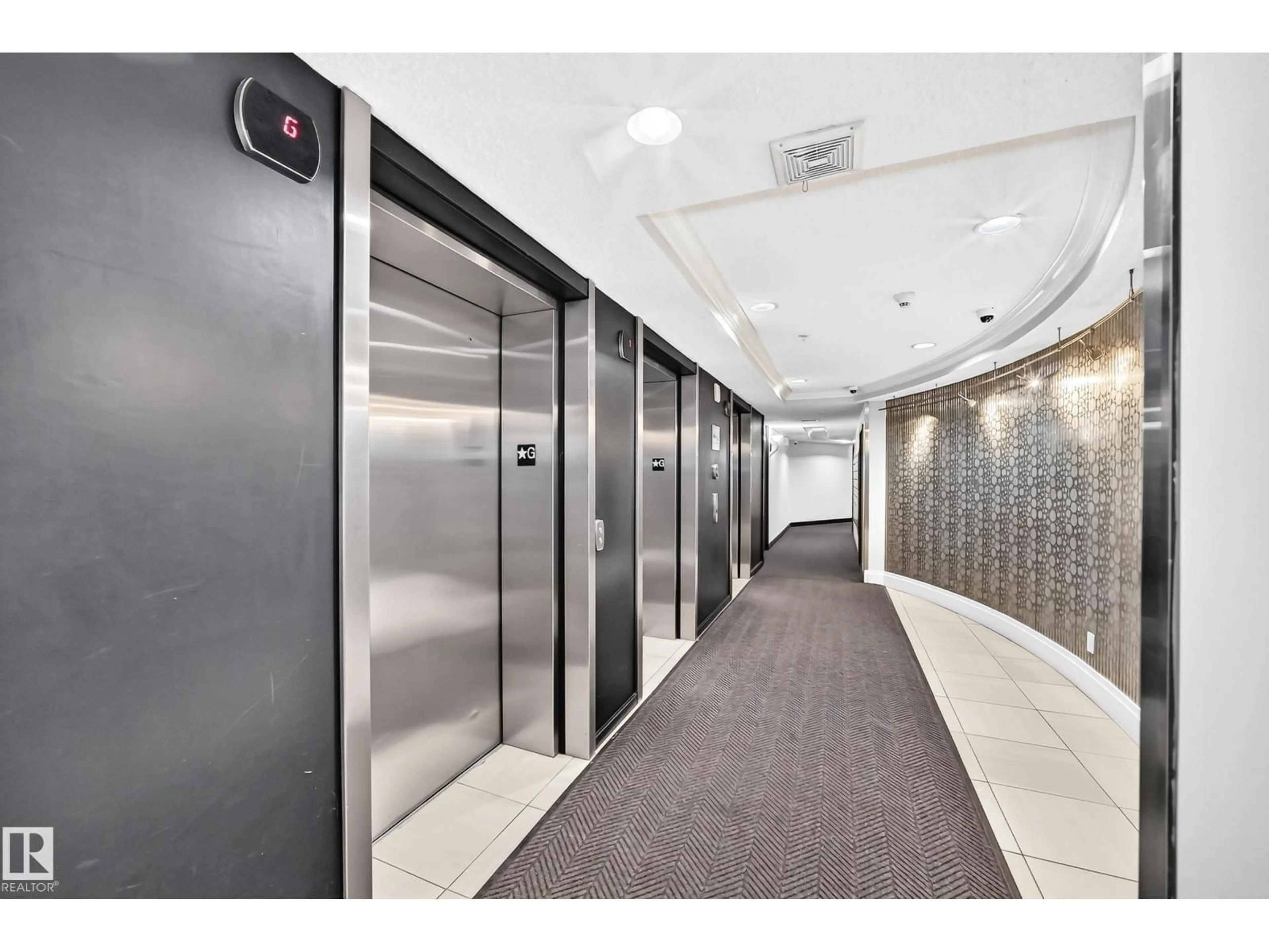 Indoor foyer for #103 - 9020 JASPER AV NW, Edmonton Alberta T5H3S8