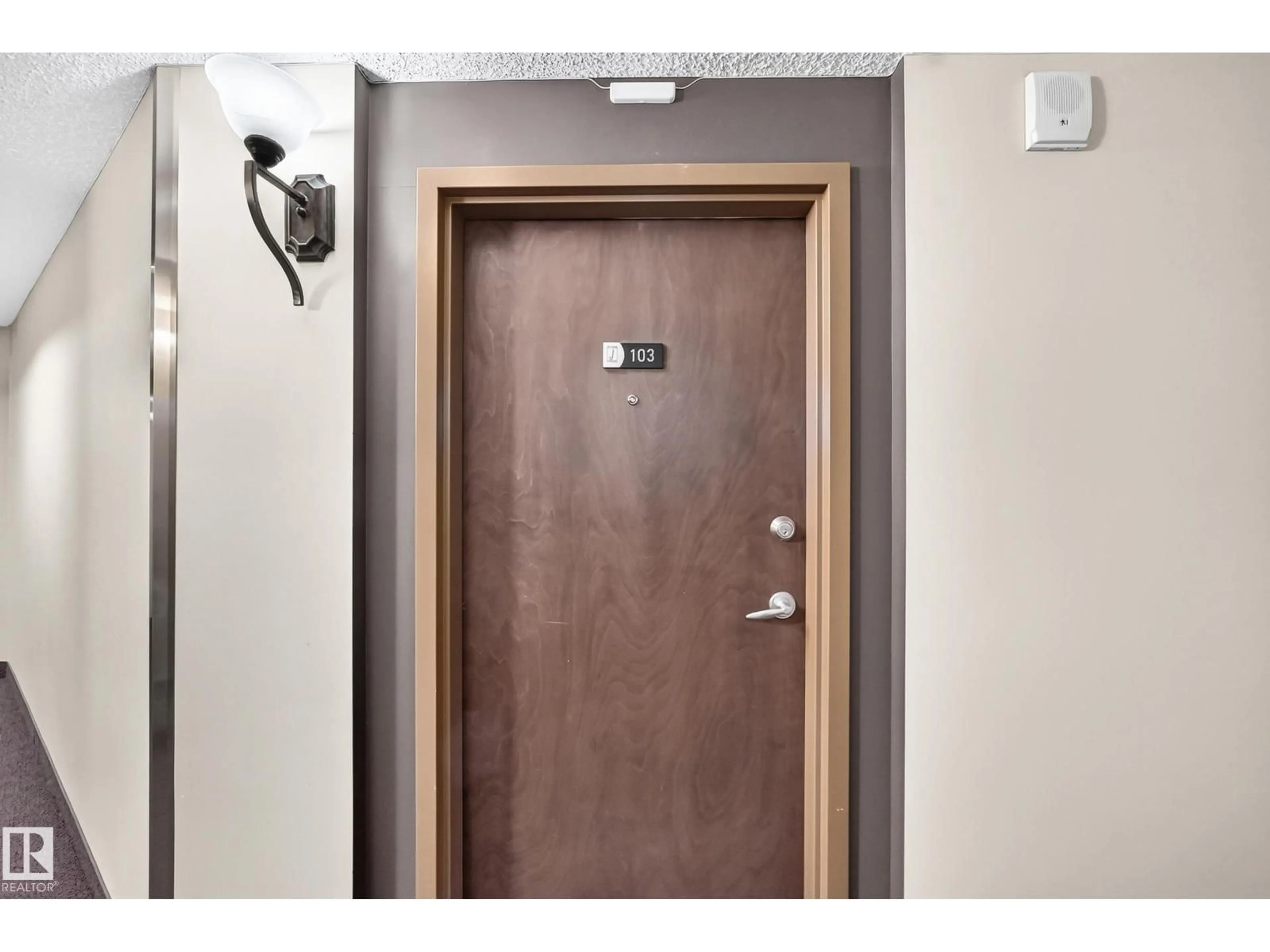 Indoor entryway for #103 - 9020 JASPER AV NW, Edmonton Alberta T5H3S8