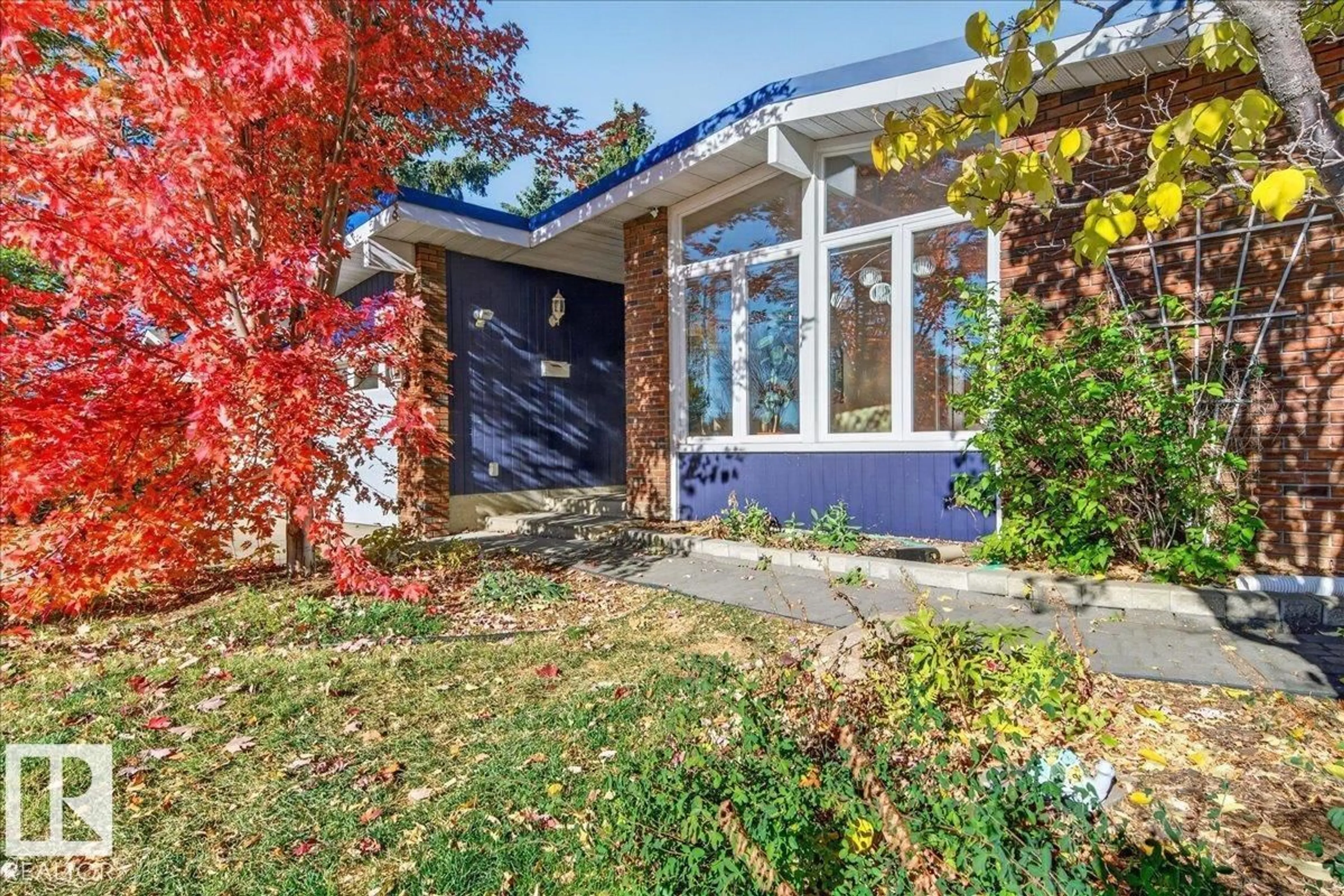 Home with brick exterior material, street for NW - 8512 134 AV, Edmonton Alberta T5E1H2