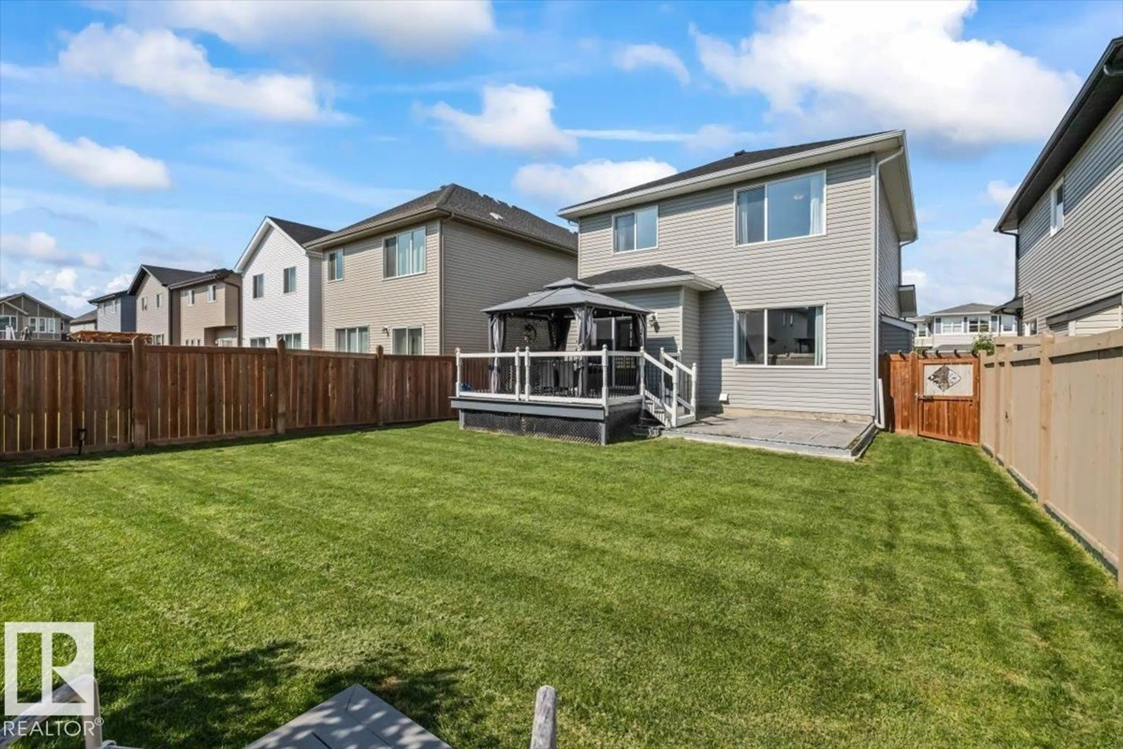 Home with vinyl exterior material, street for 22507 99 AV, Edmonton Alberta T5T7C2