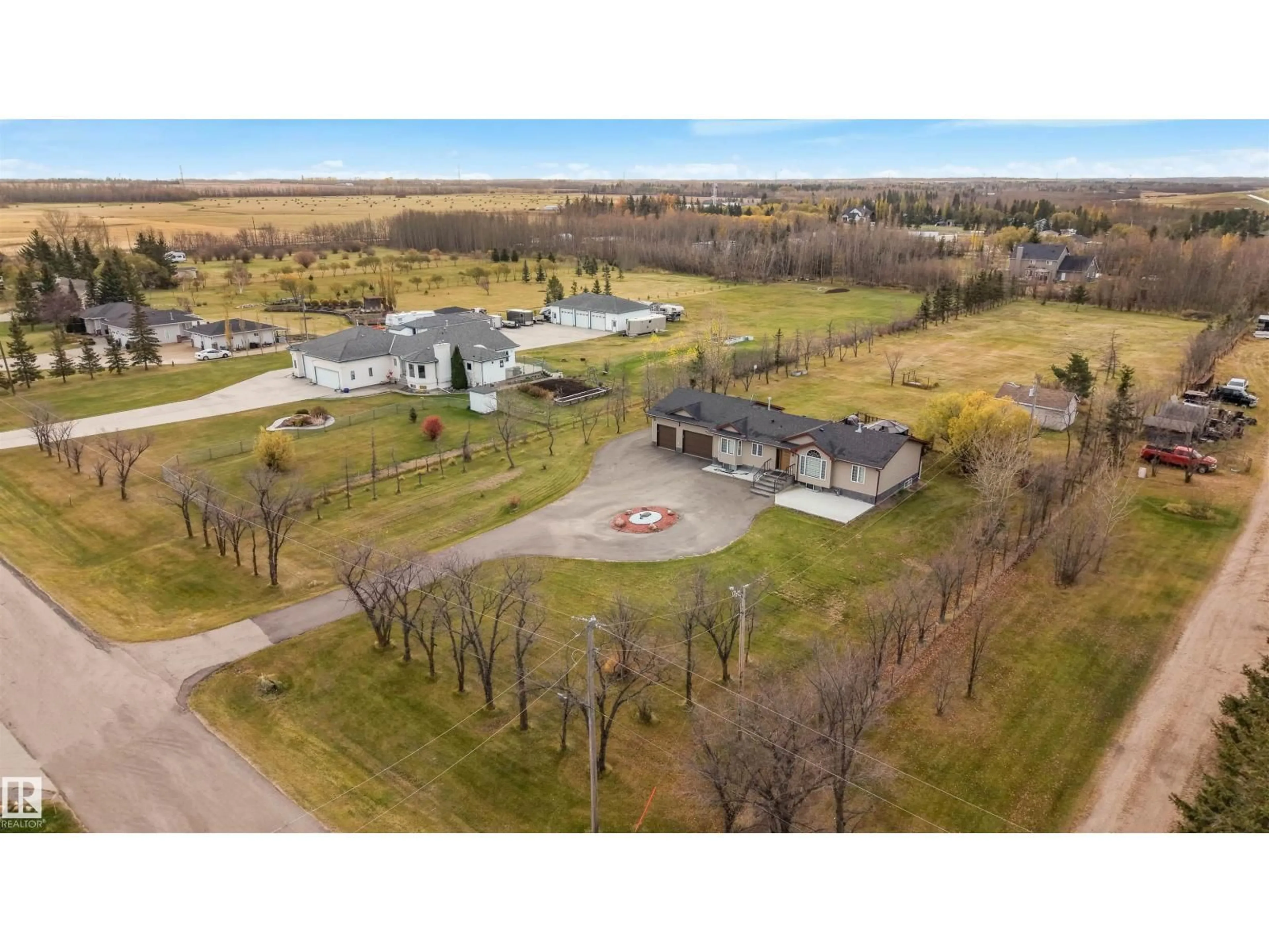 A pic from outside/outdoor area/front of a property/back of a property/a pic from drone, building for 55 50452 RGE RD, Rural Leduc County Alberta T4X0P5