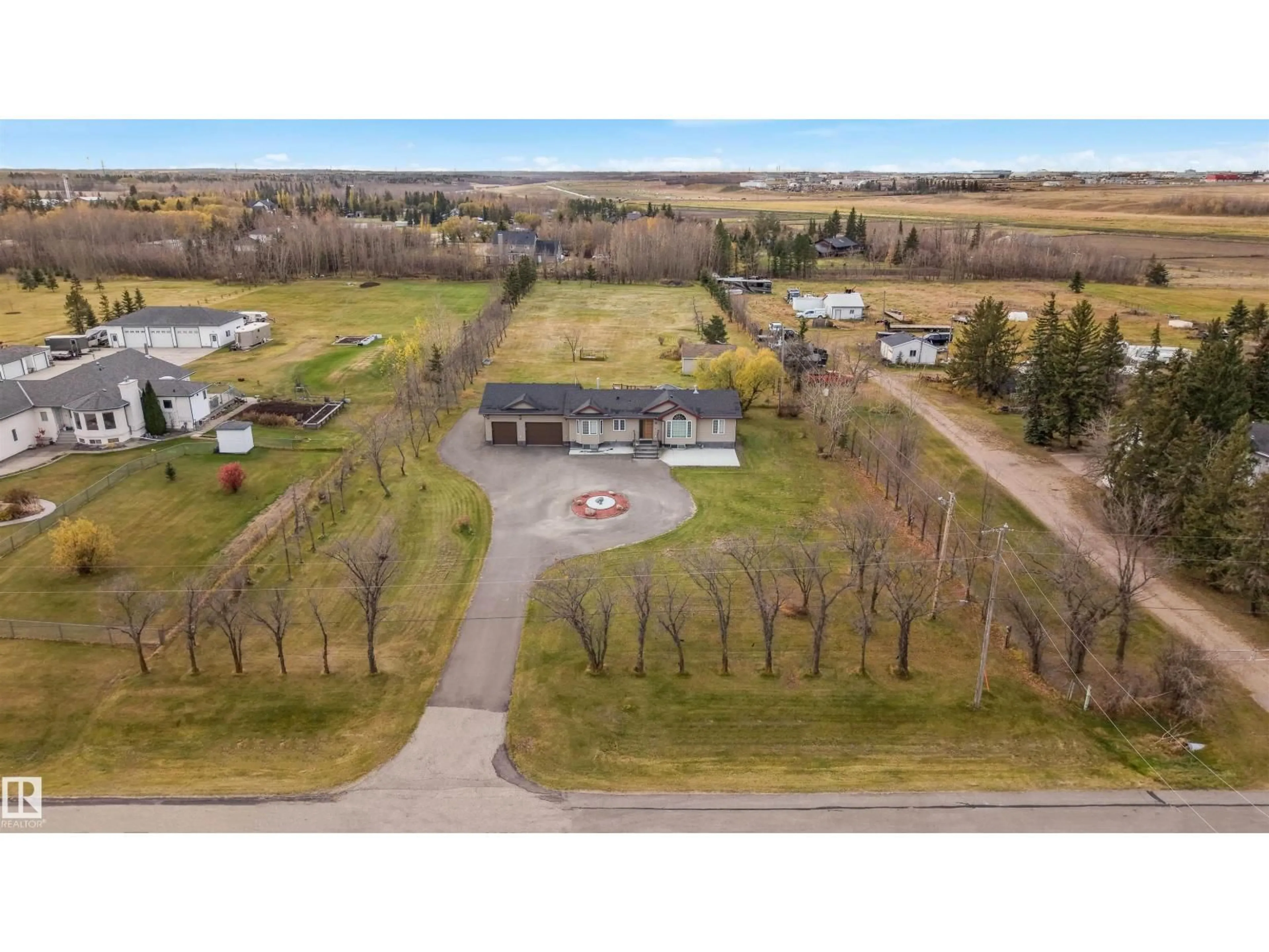 A pic from outside/outdoor area/front of a property/back of a property/a pic from drone, unknown for 55 50452 RGE RD, Rural Leduc County Alberta T4X0P5