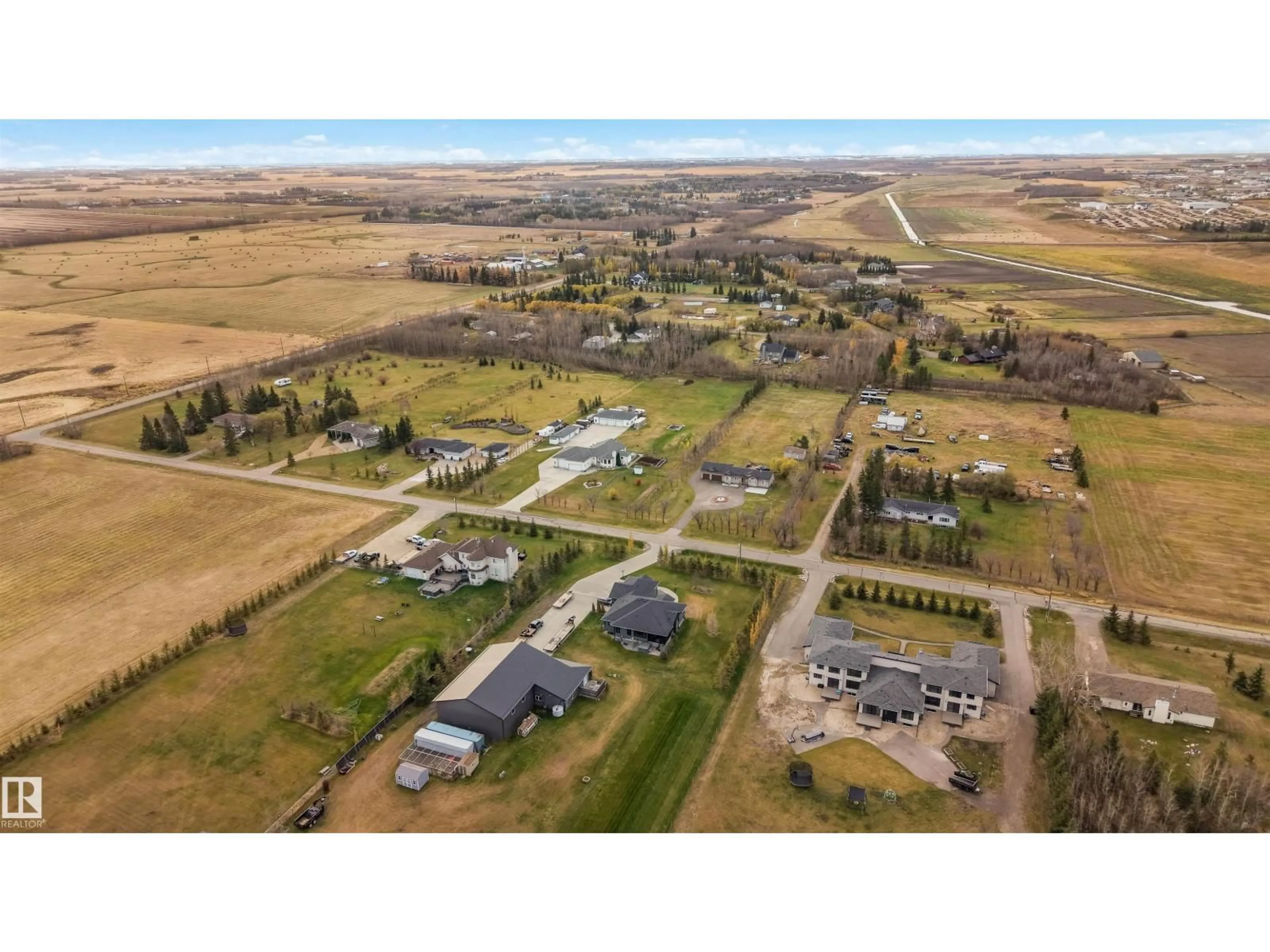 A pic from outside/outdoor area/front of a property/back of a property/a pic from drone, unknown for 55 50452 RGE RD, Rural Leduc County Alberta T4X0P5