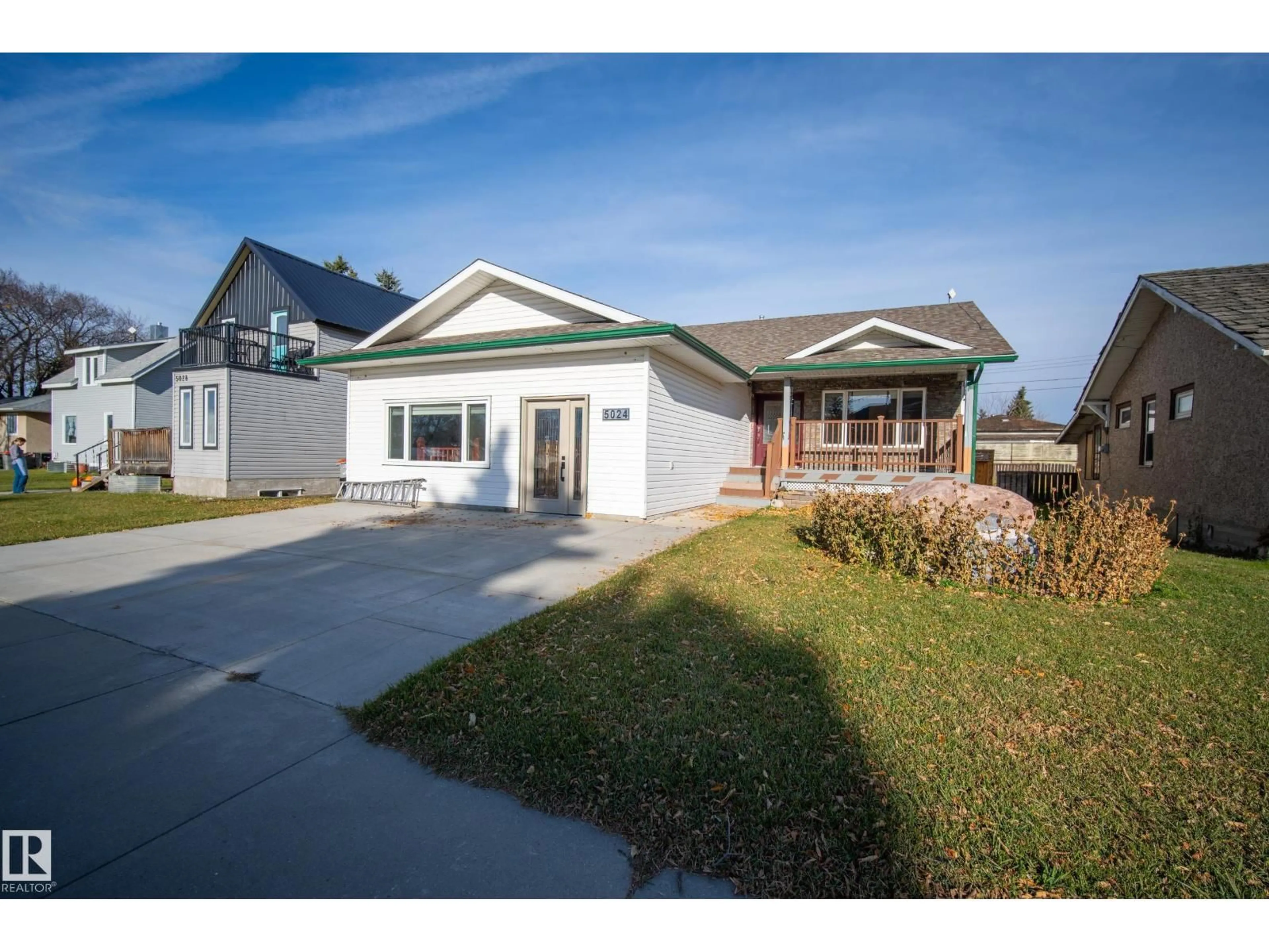 Home with vinyl exterior material, street for 5024 50 AV, Millet Alberta T0C1Z0