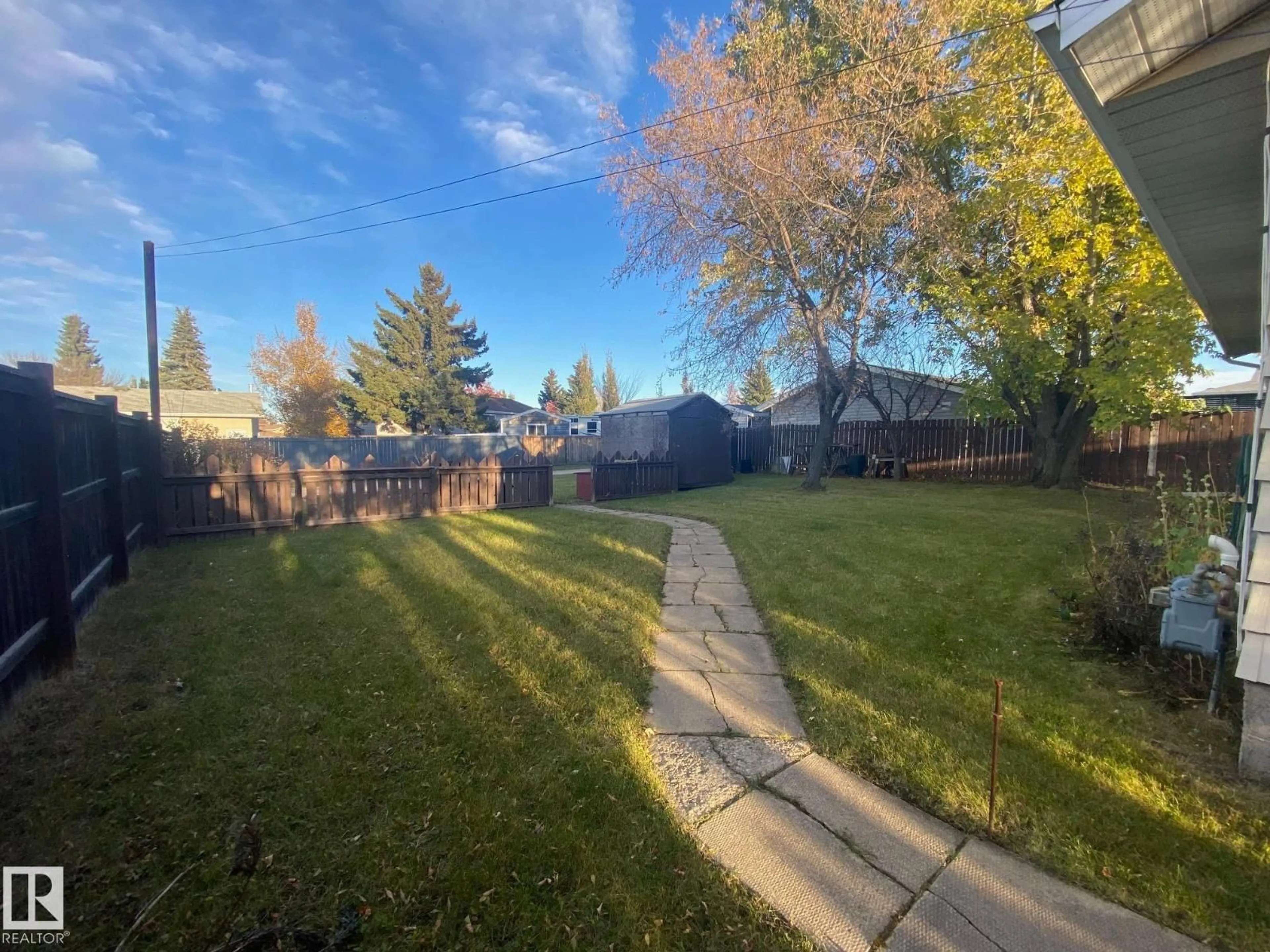 A pic from outside/outdoor area/front of a property/back of a property/a pic from drone, street for 4103 73 ST, Camrose Alberta T4V3L7