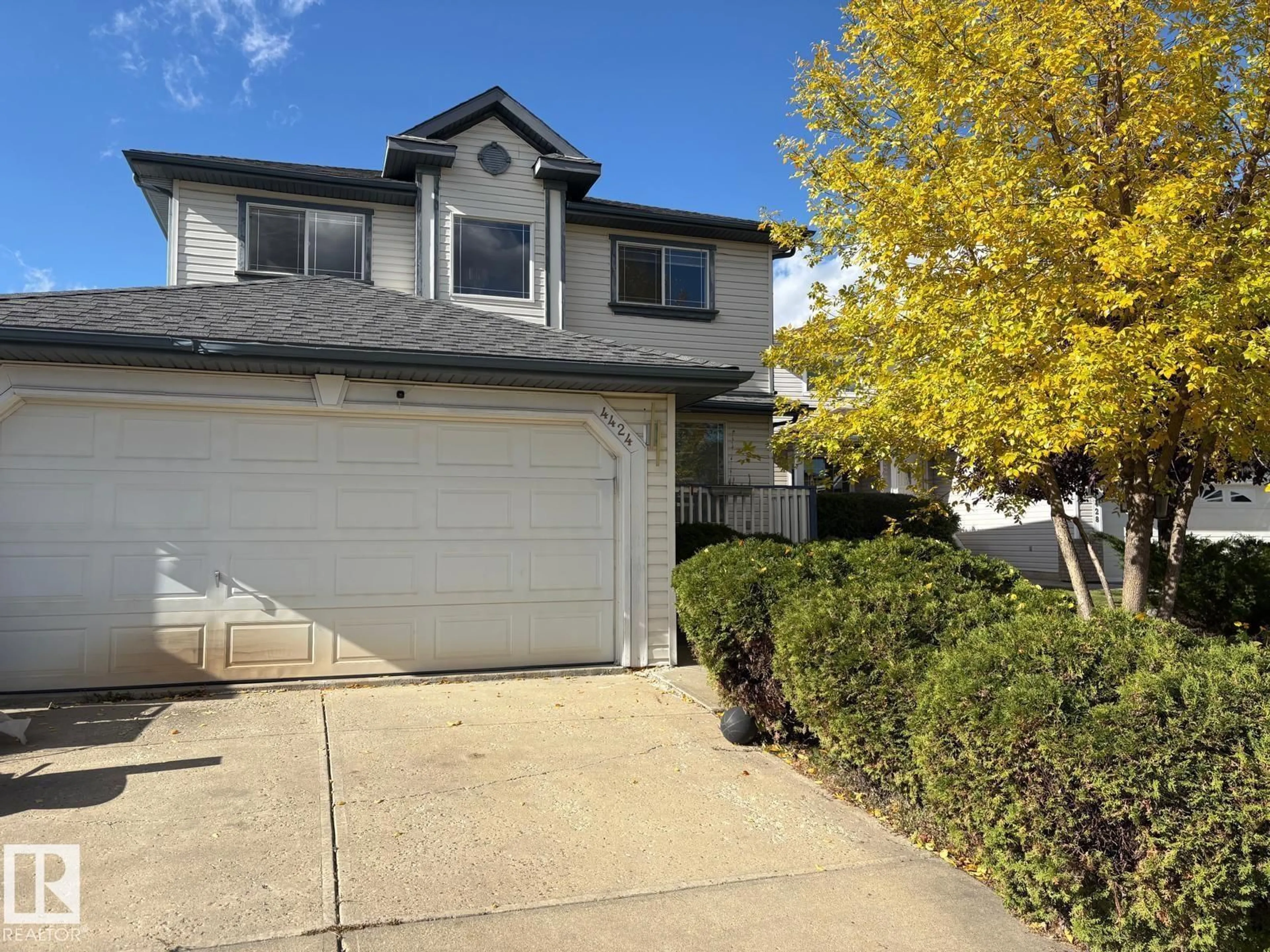 Home with vinyl exterior material, street for 4424 28A ST NW, Edmonton Alberta T6T1K1
