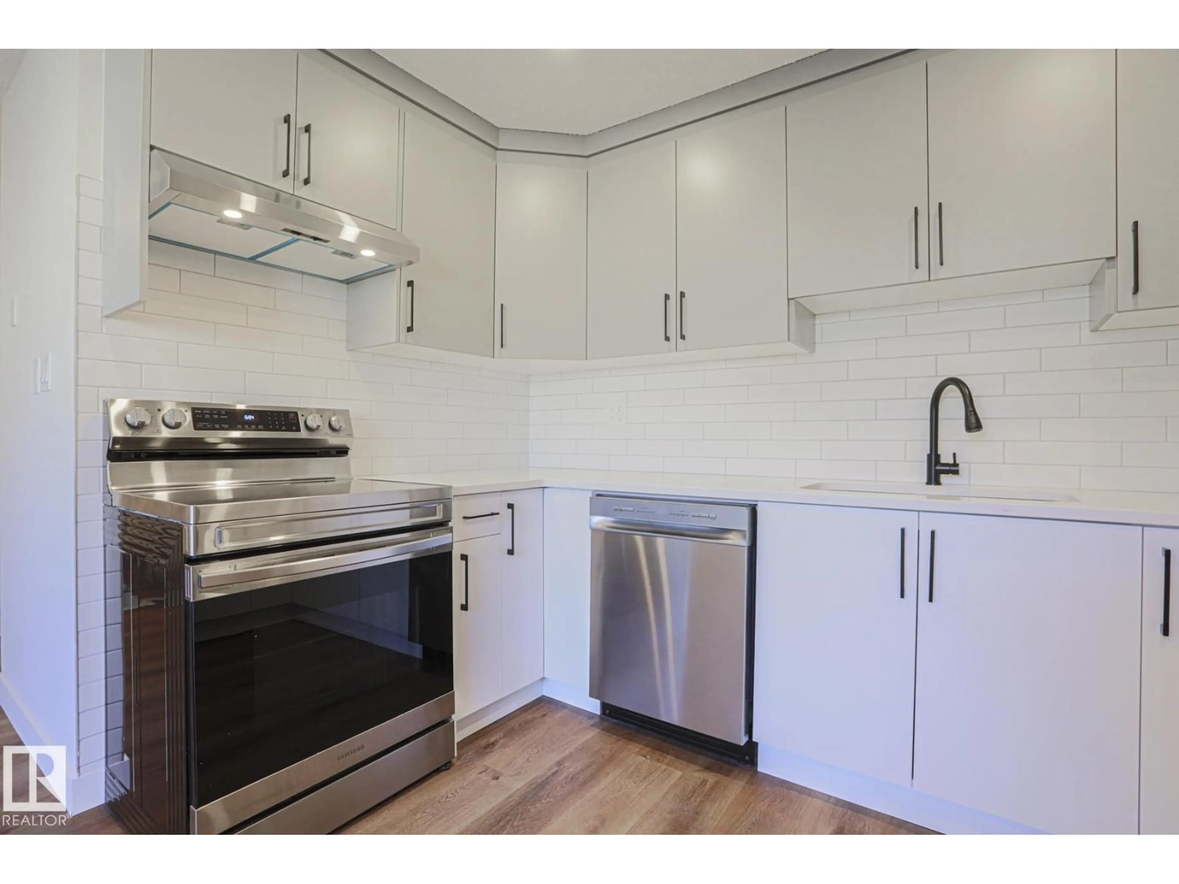 Standard kitchen, wood/laminate floor for NW - 3237 132A AV, Edmonton Alberta T5A3K4