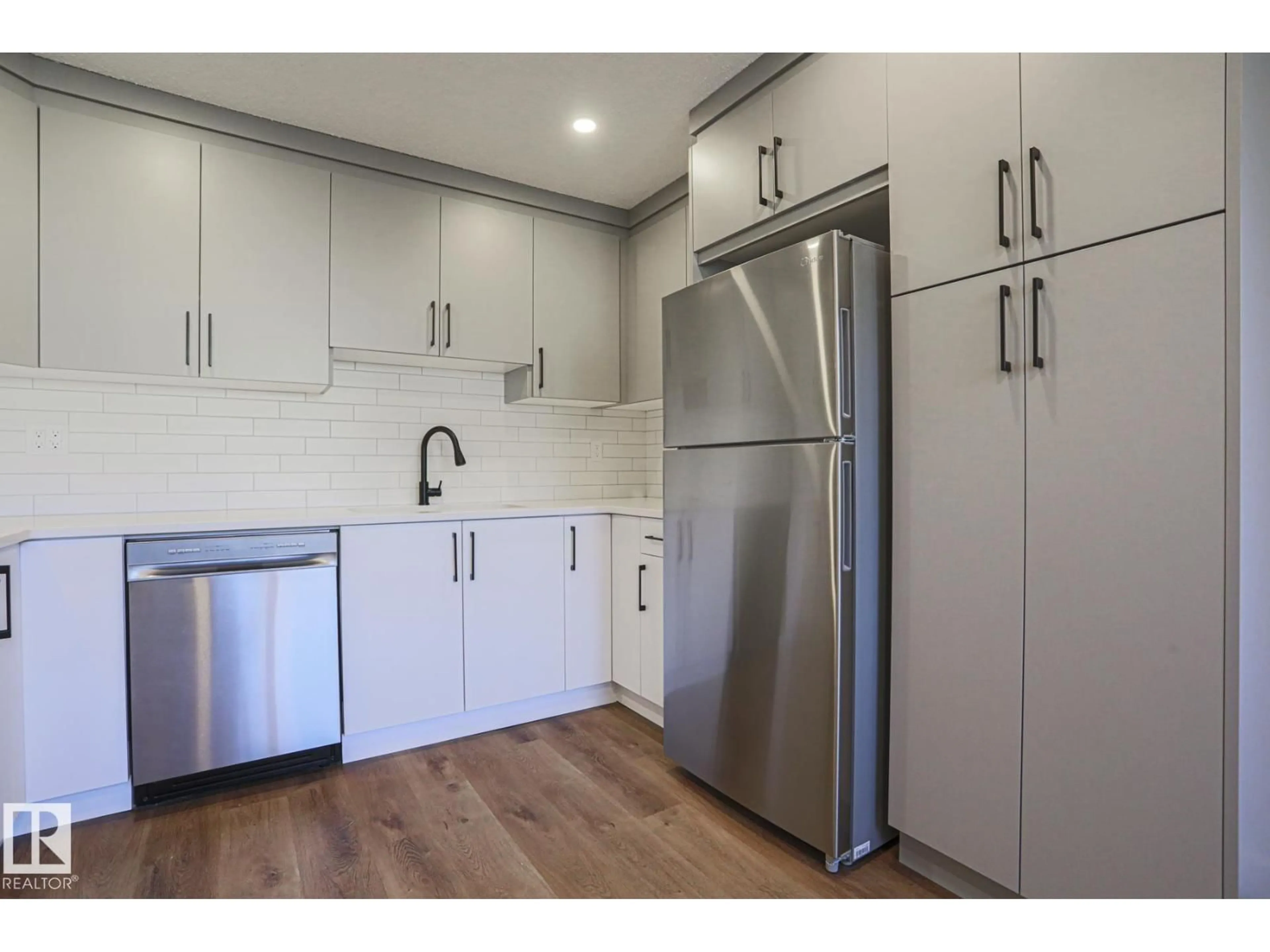 Standard kitchen, wood/laminate floor for NW - 3237 132A AV, Edmonton Alberta T5A3K4