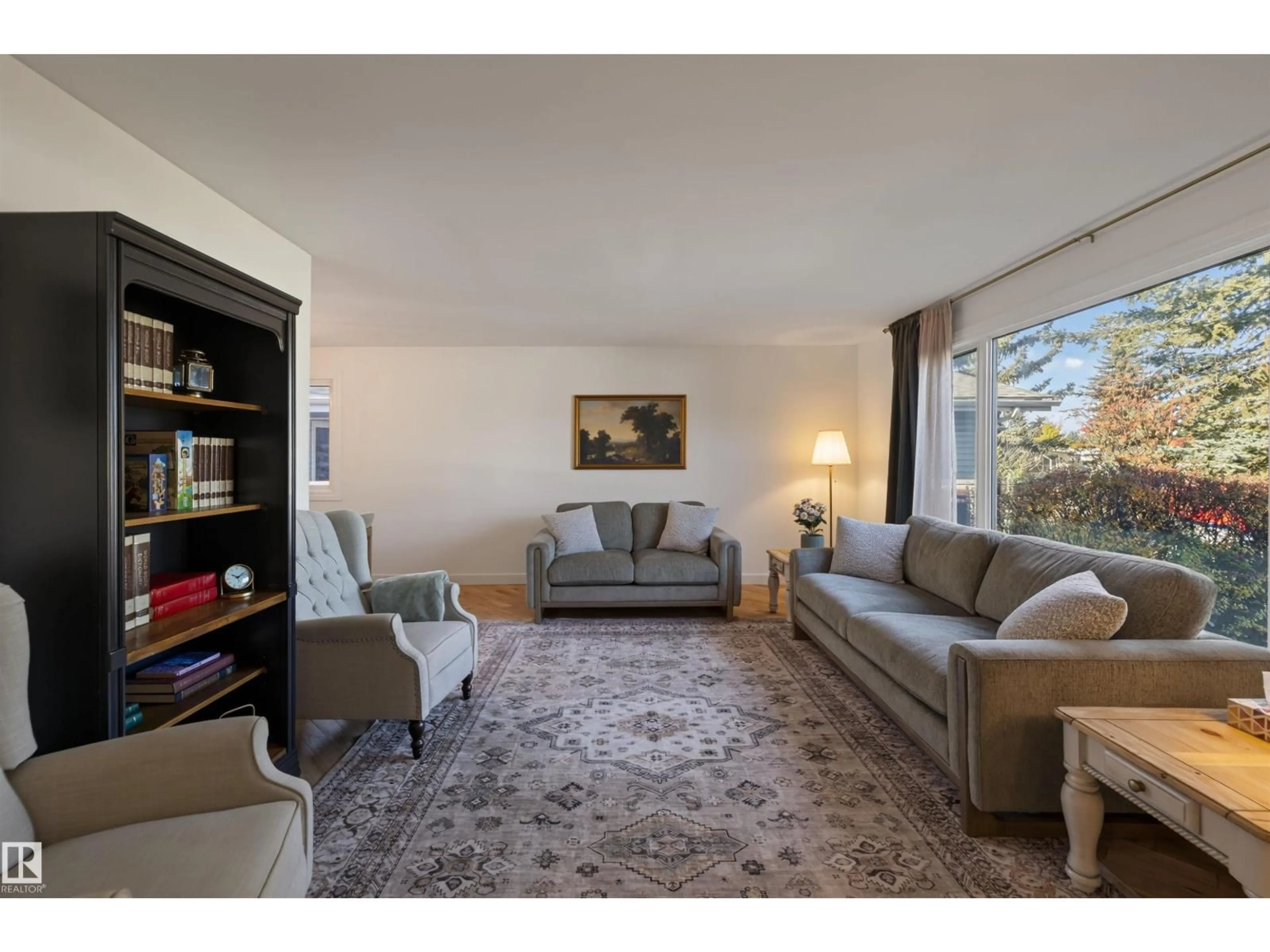 Living room with furniture, unknown for 10563 35 AVE, Edmonton Alberta T6J2M1