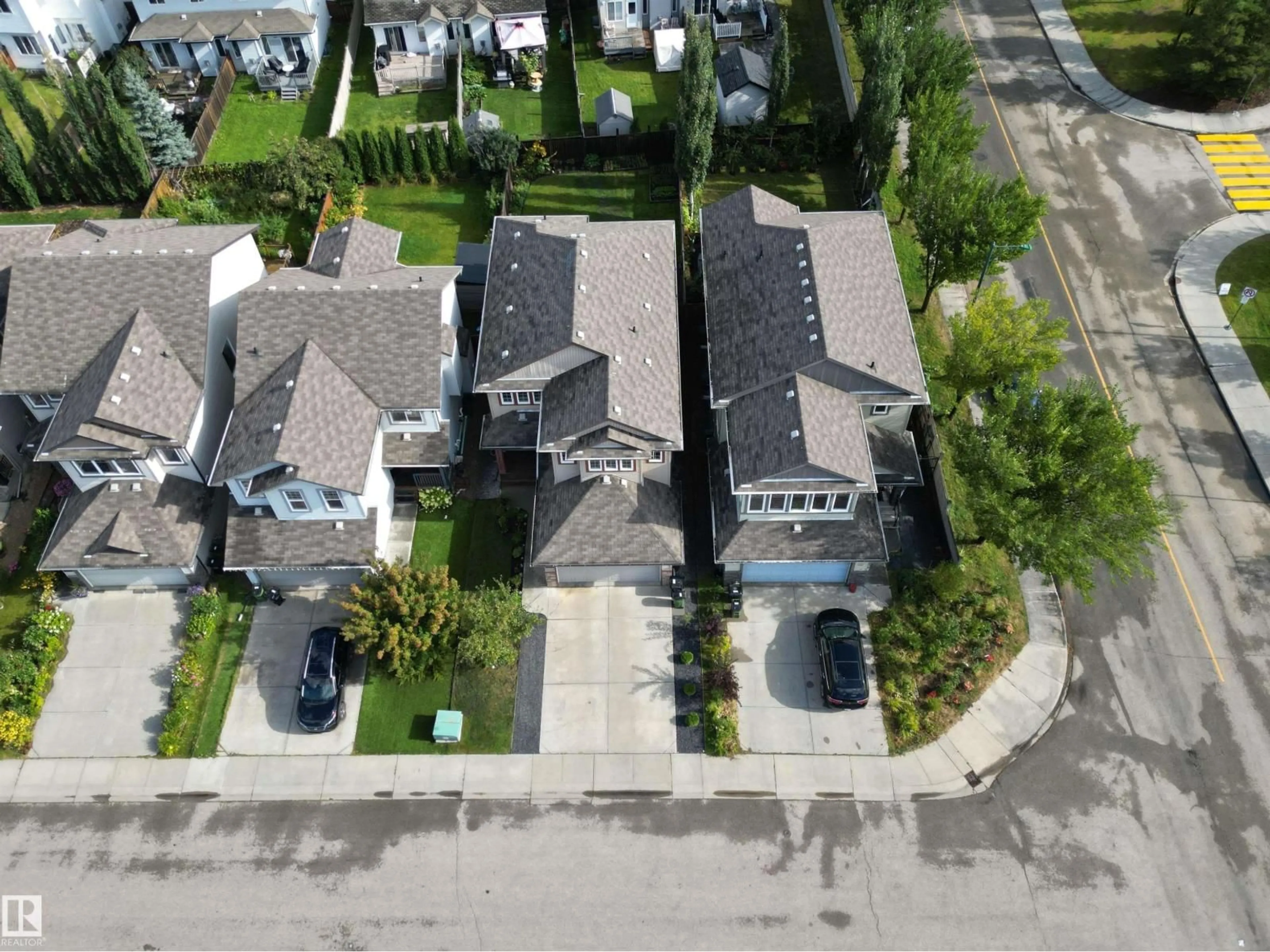 A pic from outside/outdoor area/front of a property/back of a property/a pic from drone, street for SW - 11408 15 AV, Edmonton Alberta T6W0Z8