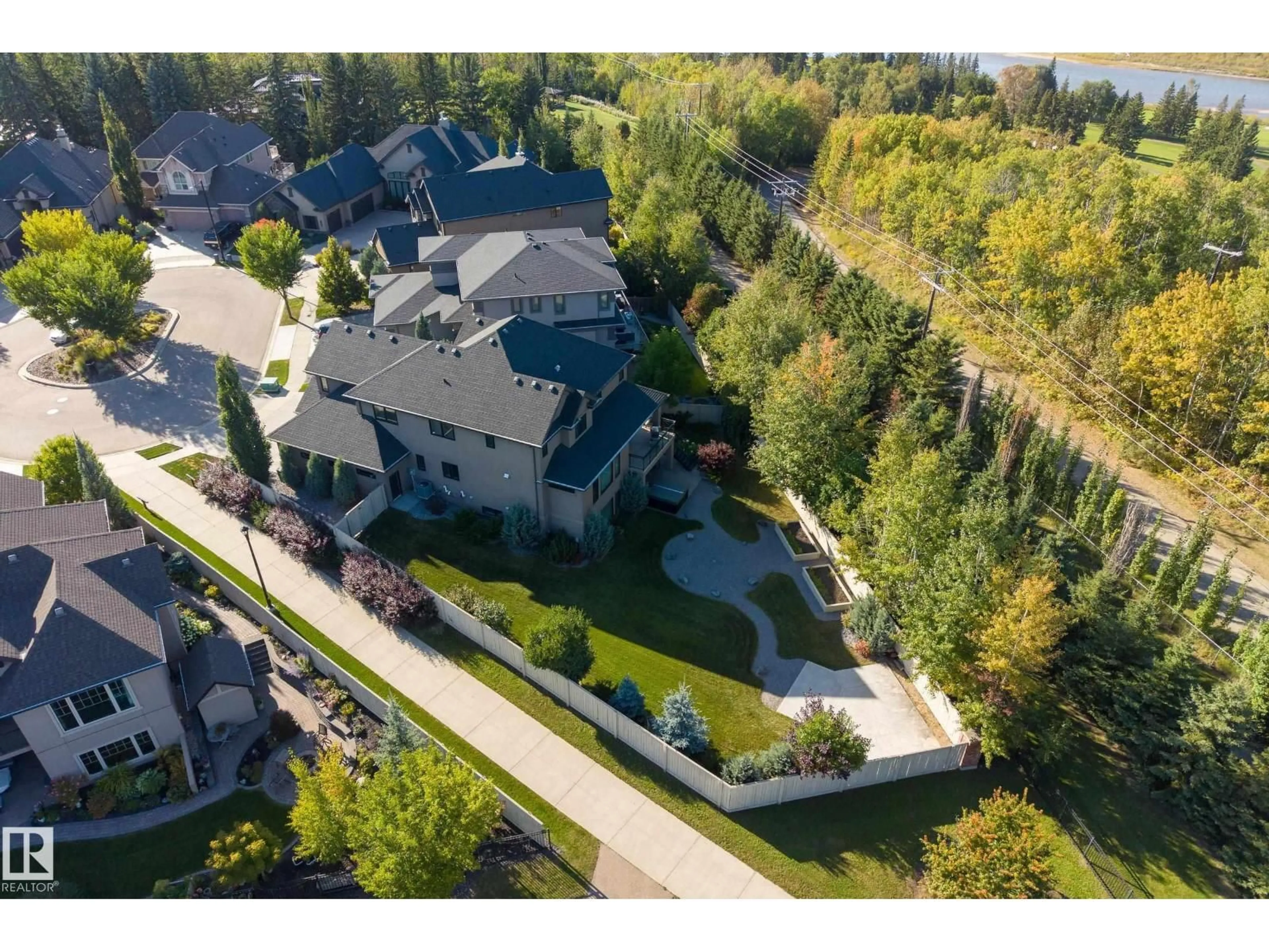 A pic from outside/outdoor area/front of a property/back of a property/a pic from drone, street for 4431 KENNEDY CV, Edmonton Alberta T6W3B3