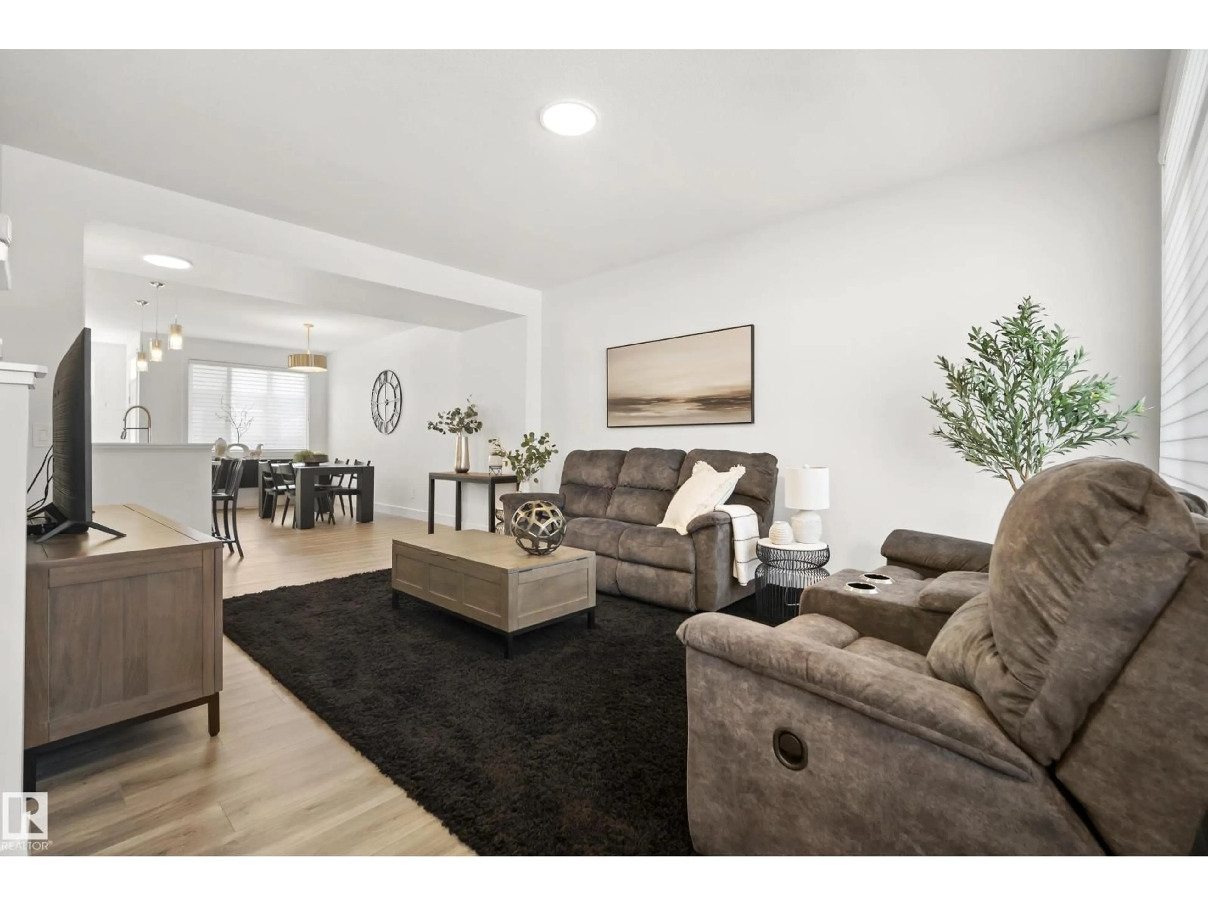Living room with furniture, wood/laminate floor for 175 KINGLET BV, Edmonton Alberta T5S0S6