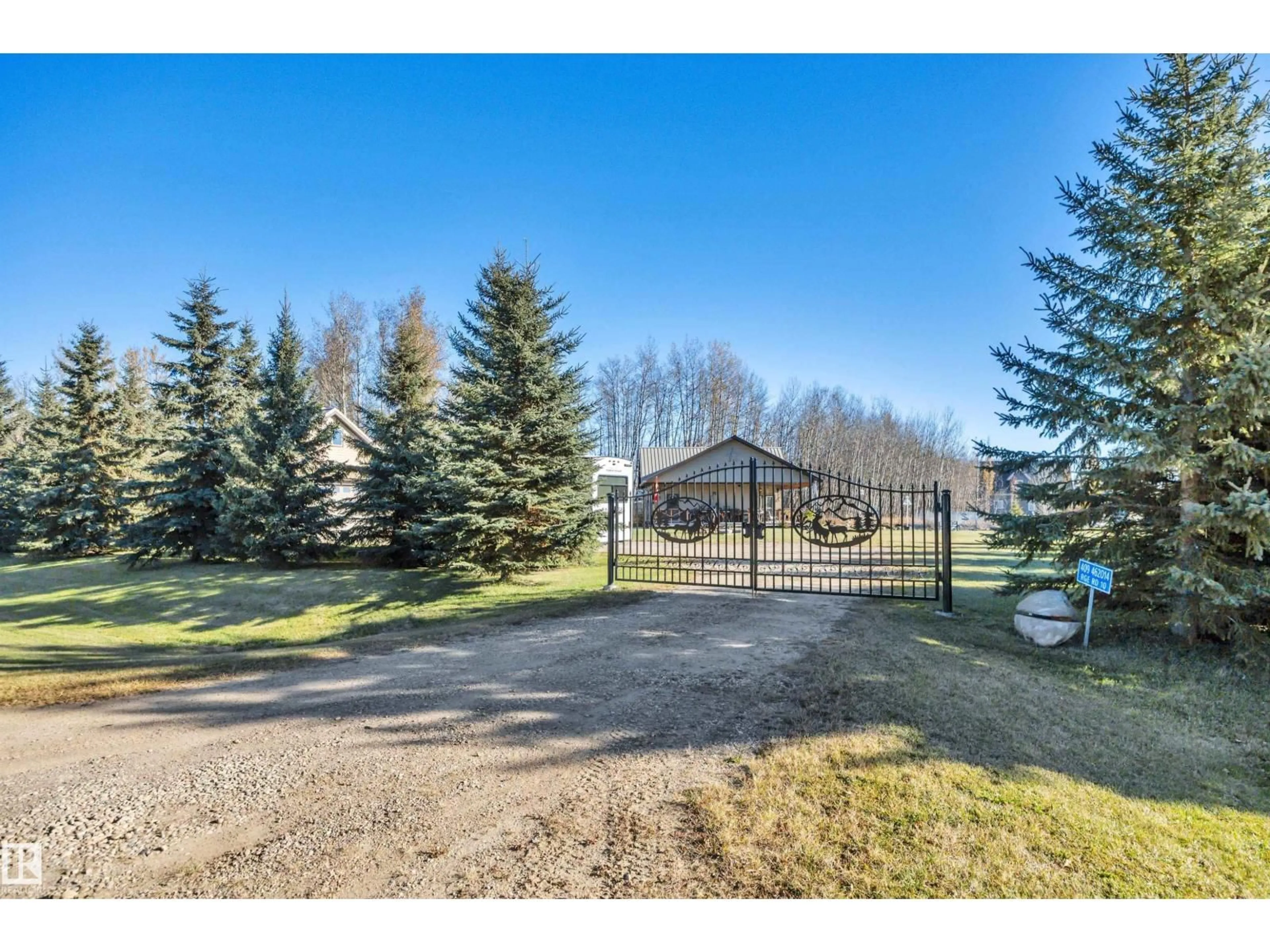 A pic from outside/outdoor area/front of a property/back of a property/a pic from drone, mountain view for 409 462014 RGE ROAD 10, Rural Wetaskiwin County Alberta T0C2V0