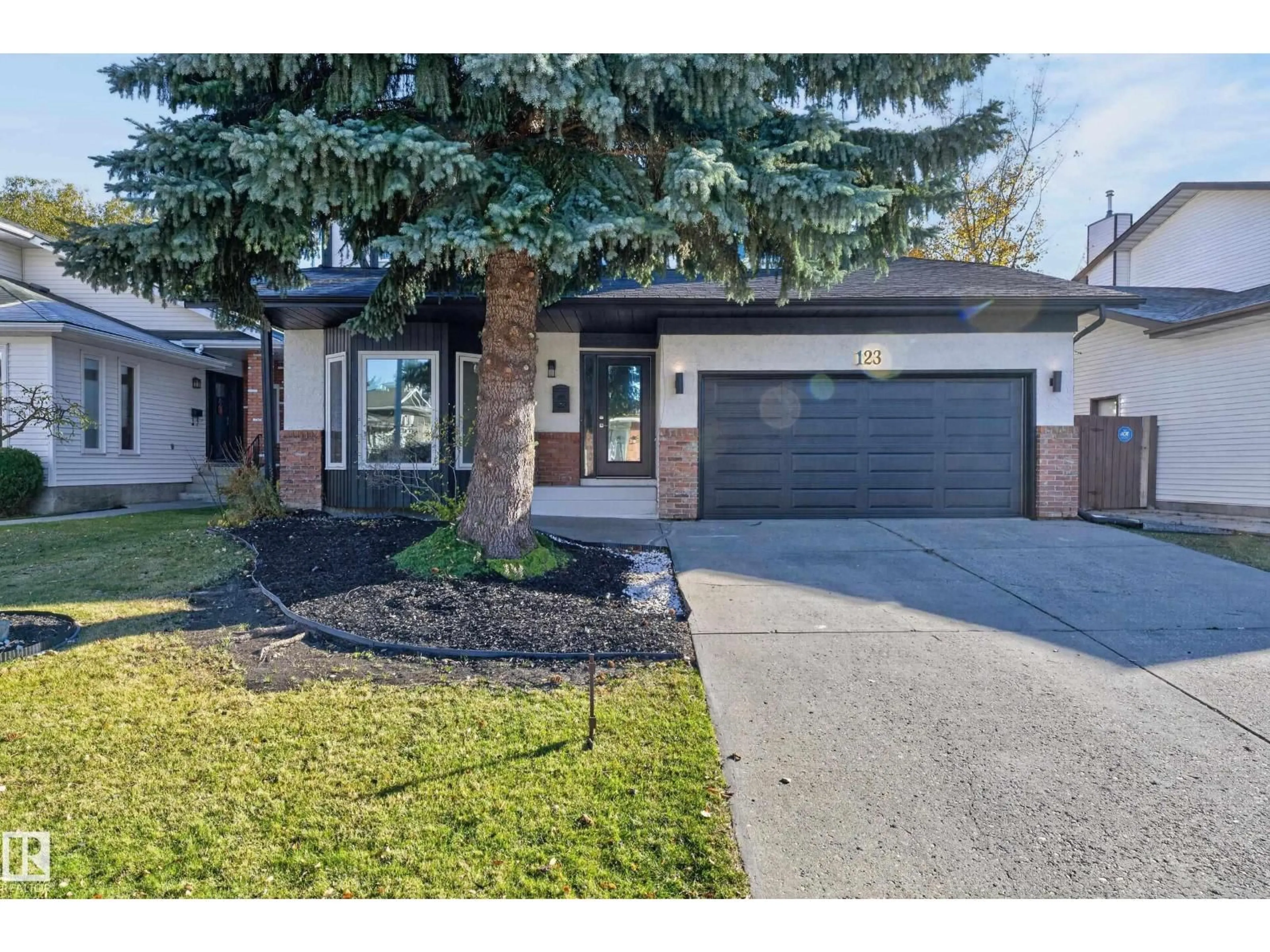 Home with brick exterior material, street for 123 WALKER RD, Edmonton Alberta T5T4C2