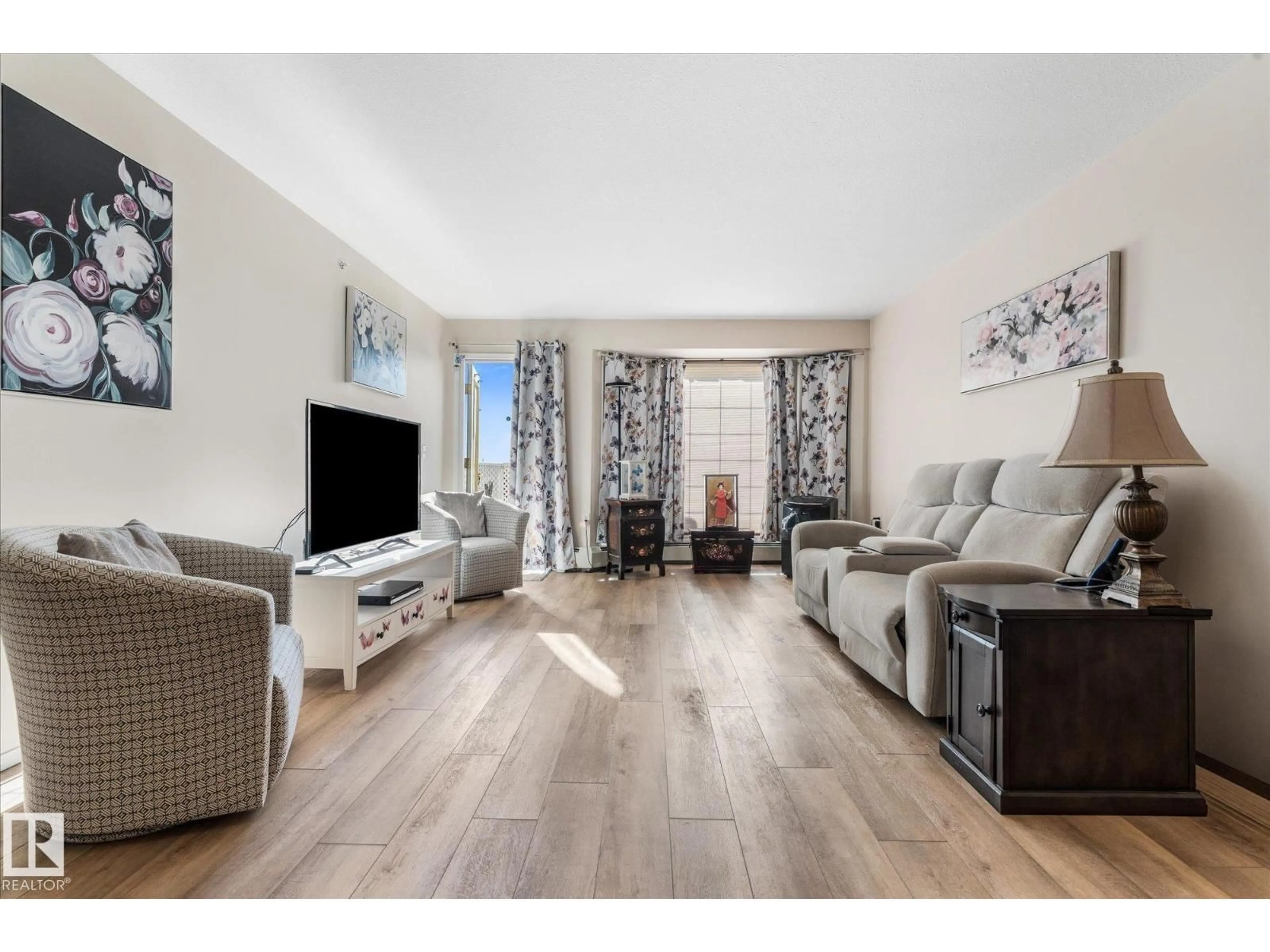 Living room with furniture, unknown for 452 13441 127 ST NW, Edmonton Alberta T5L5B6