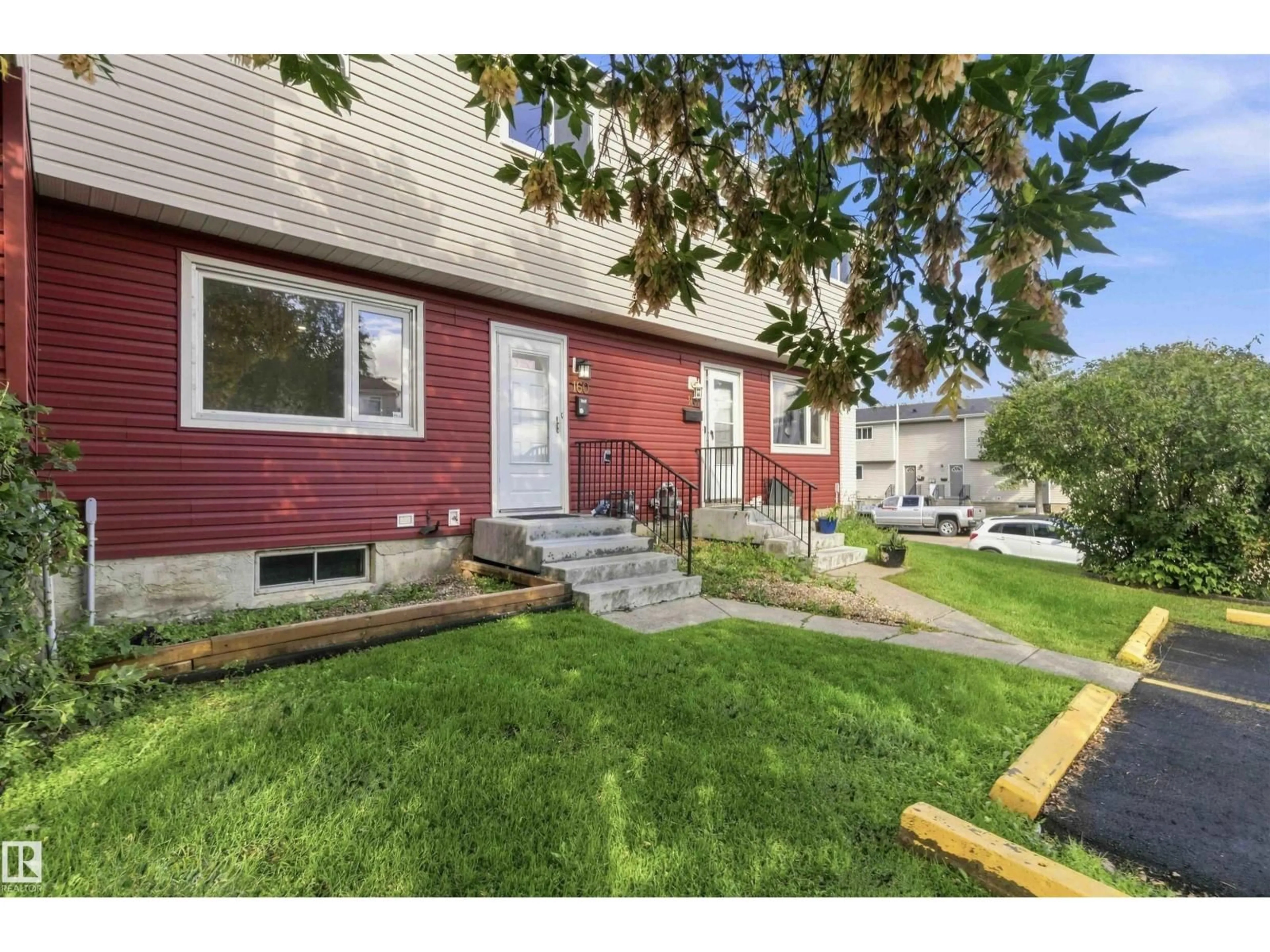 Home with vinyl exterior material, street for 160 HABITAT CR, Edmonton Alberta T5A2X7