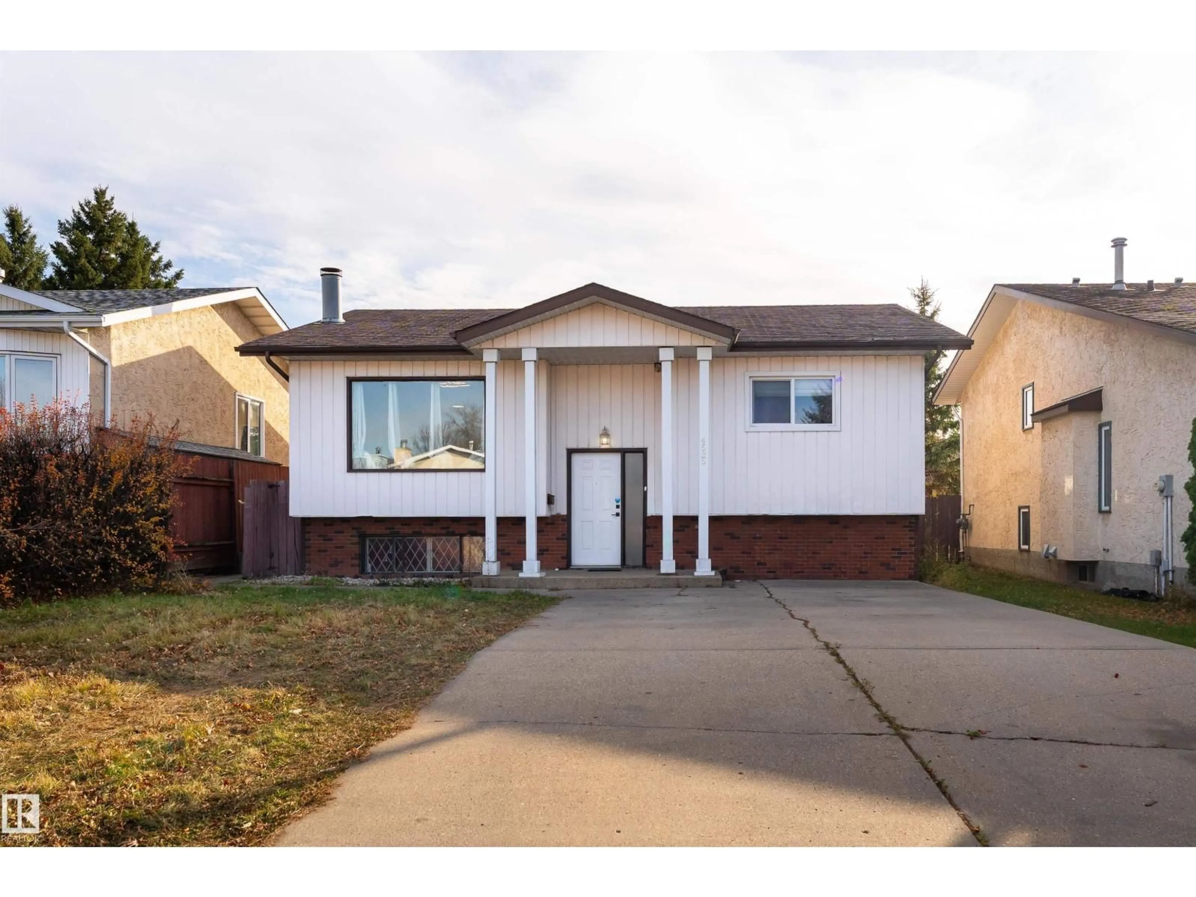 Home with brick exterior material, street for 4535 30 AV, Edmonton Alberta T6L4S6
