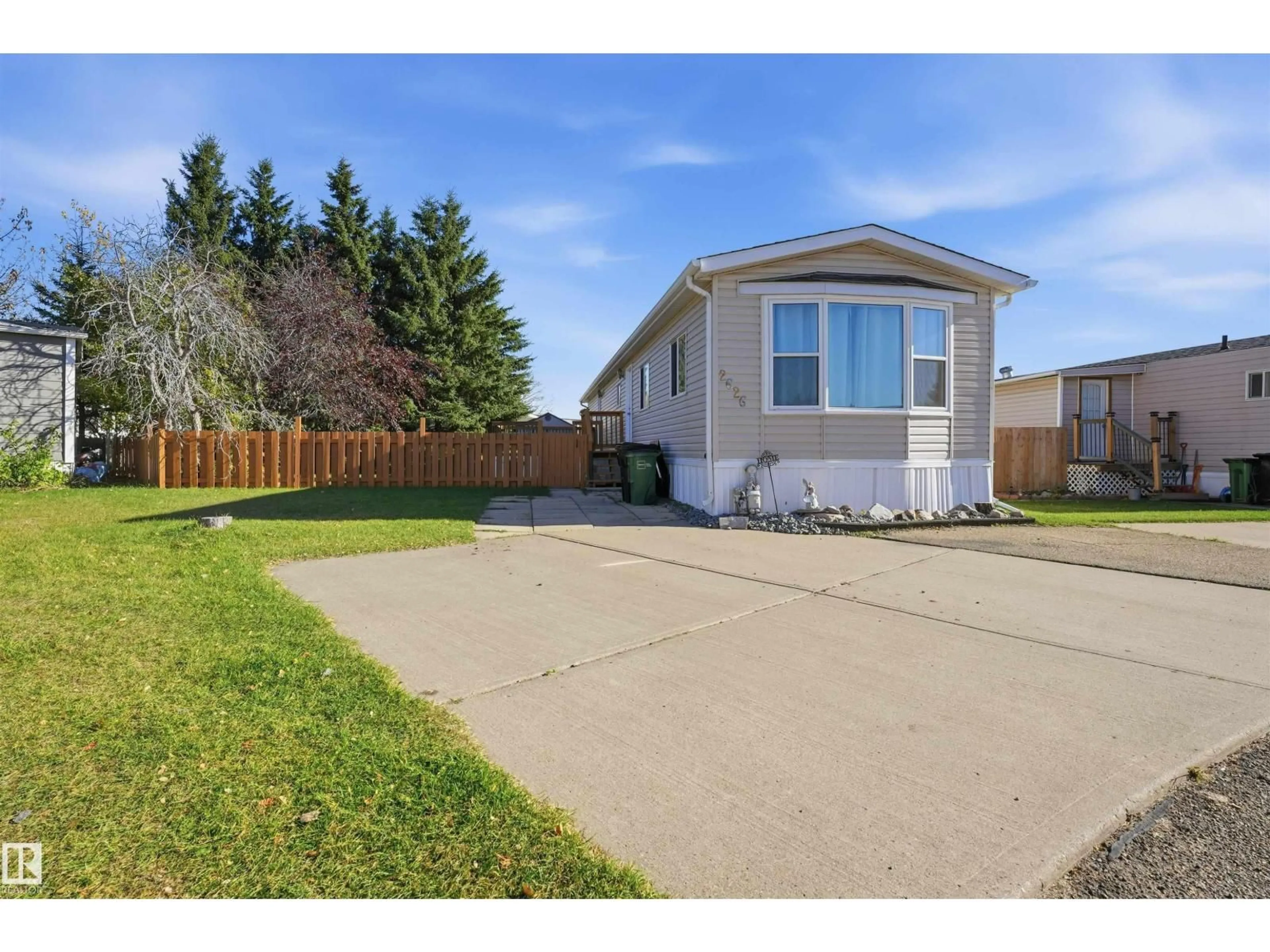 Home with vinyl exterior material, street for 10770 - 2626 WINTERBURN RD, Edmonton Alberta T5S1T7