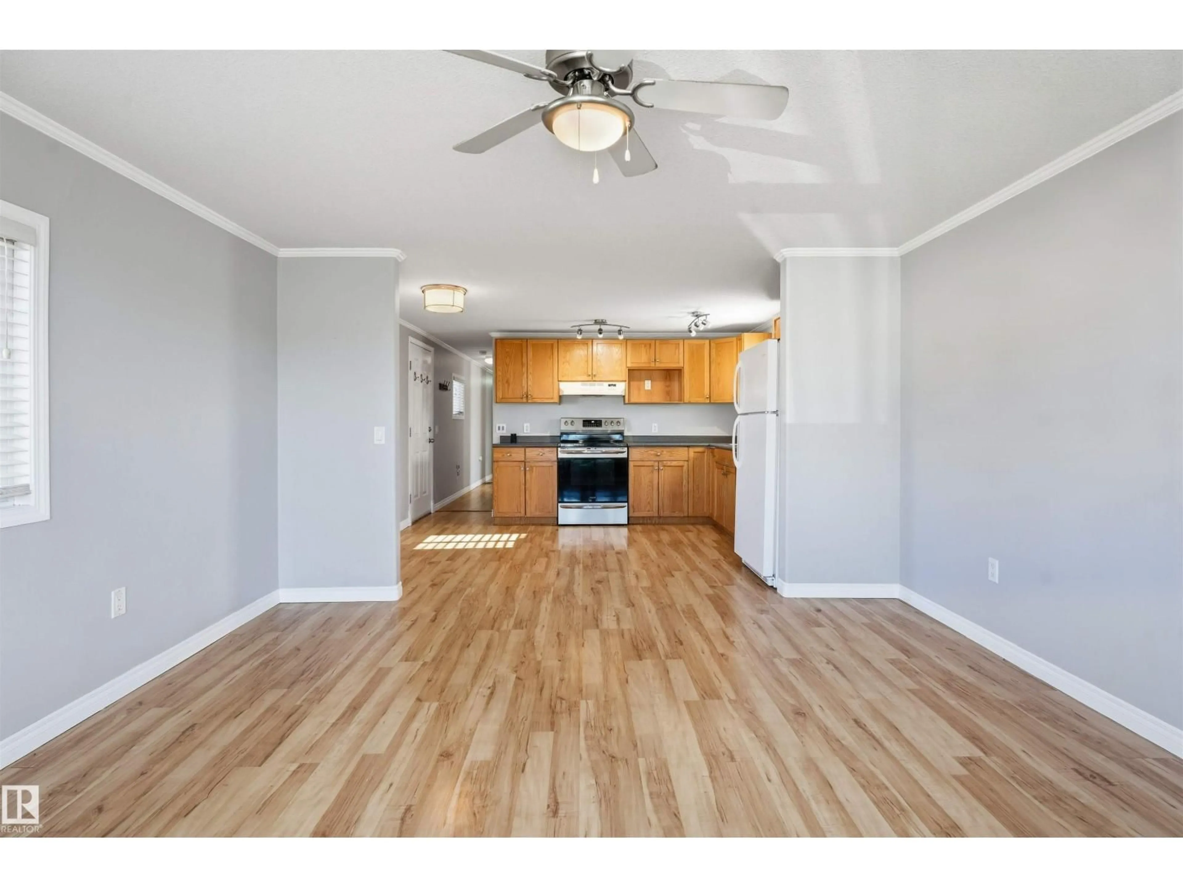 Open concept kitchen, wood/laminate floor for 10770 - 2626 WINTERBURN RD, Edmonton Alberta T5S1T7