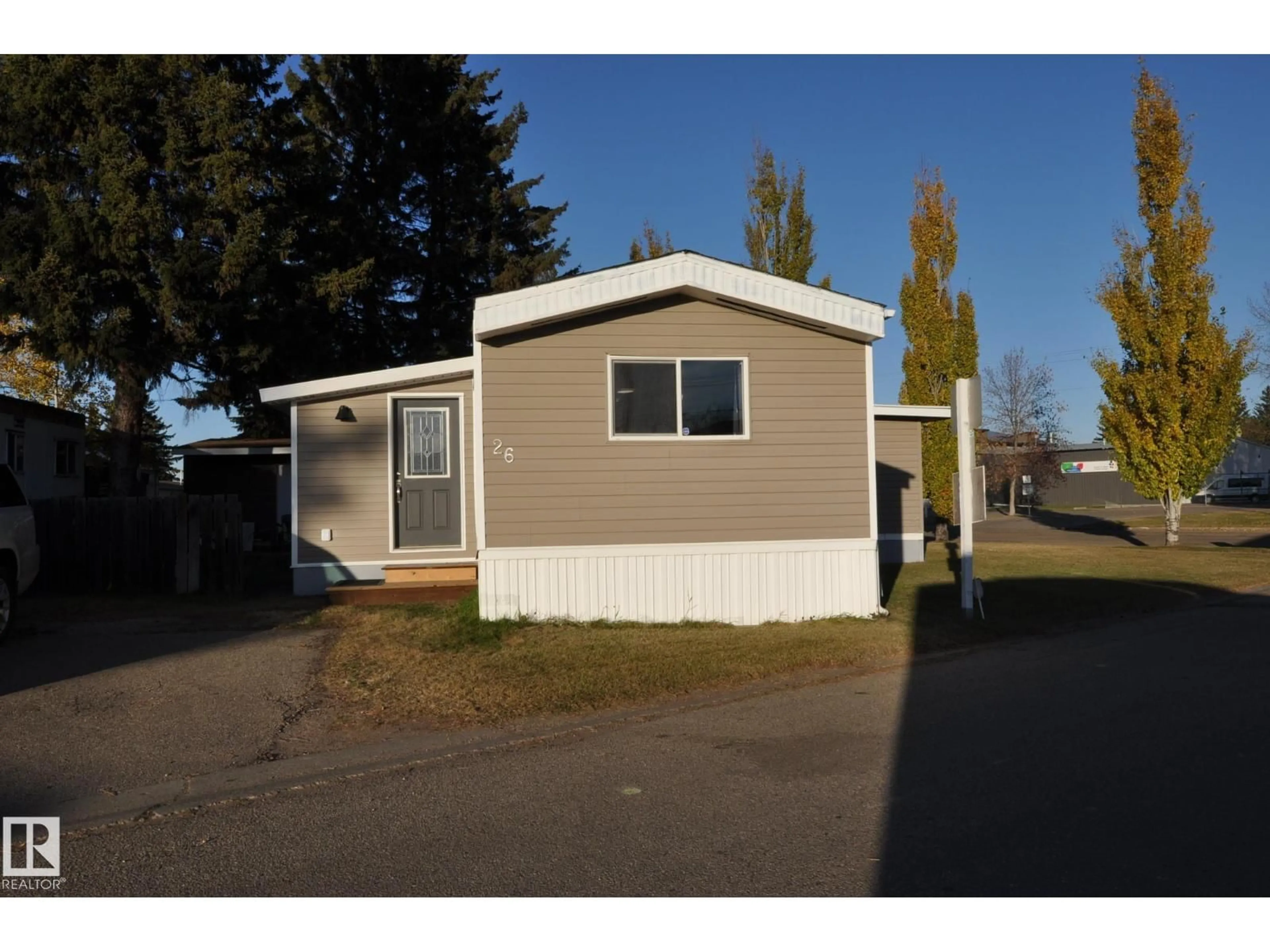 Home with vinyl exterior material, street for #26 - 10410 101 A ST, Morinville Alberta T8R1B1