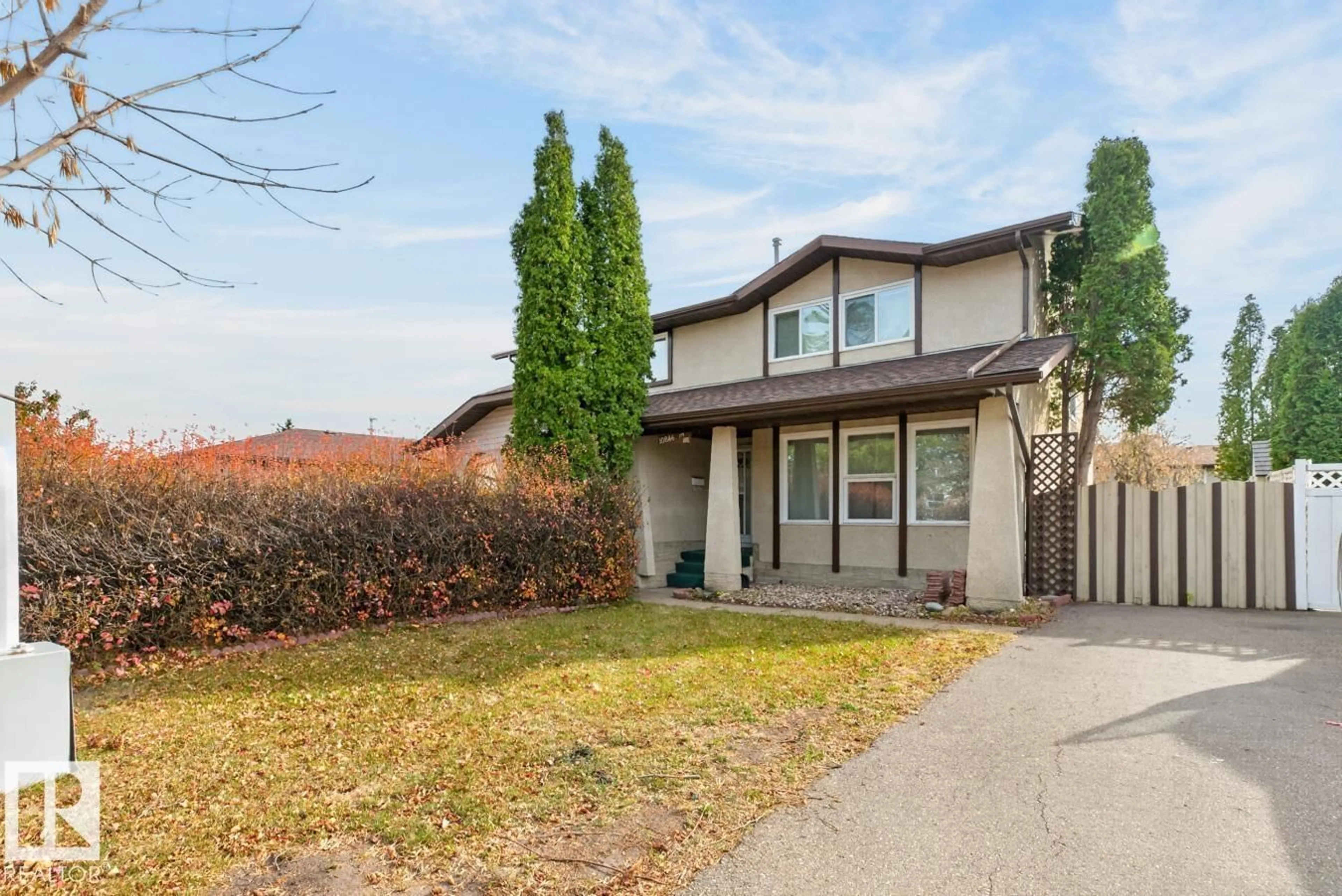 Home with vinyl exterior material, street for 10846 173 AV, Edmonton Alberta T5X3Z4