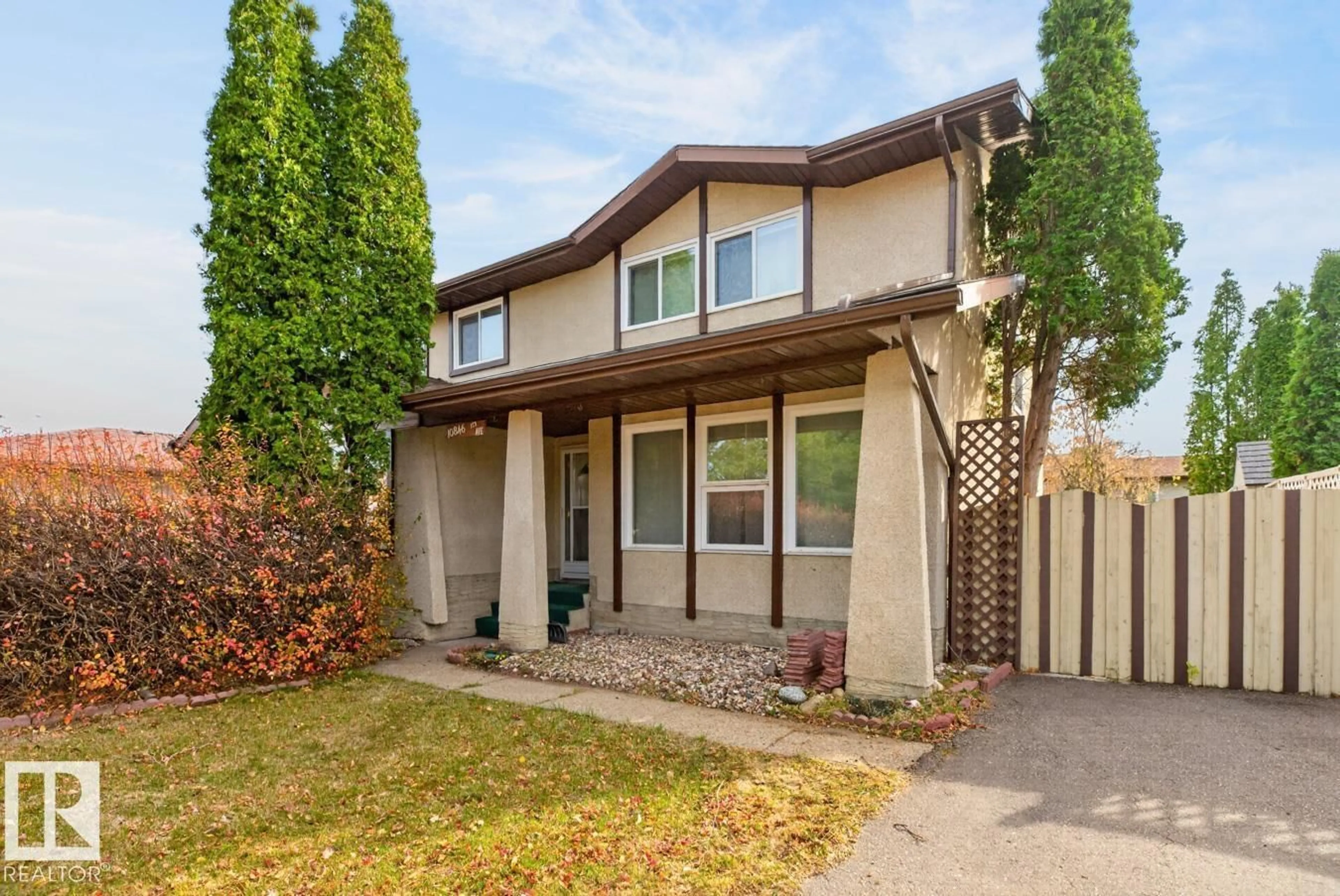Home with vinyl exterior material, street for 10846 173 AV, Edmonton Alberta T5X3Z4