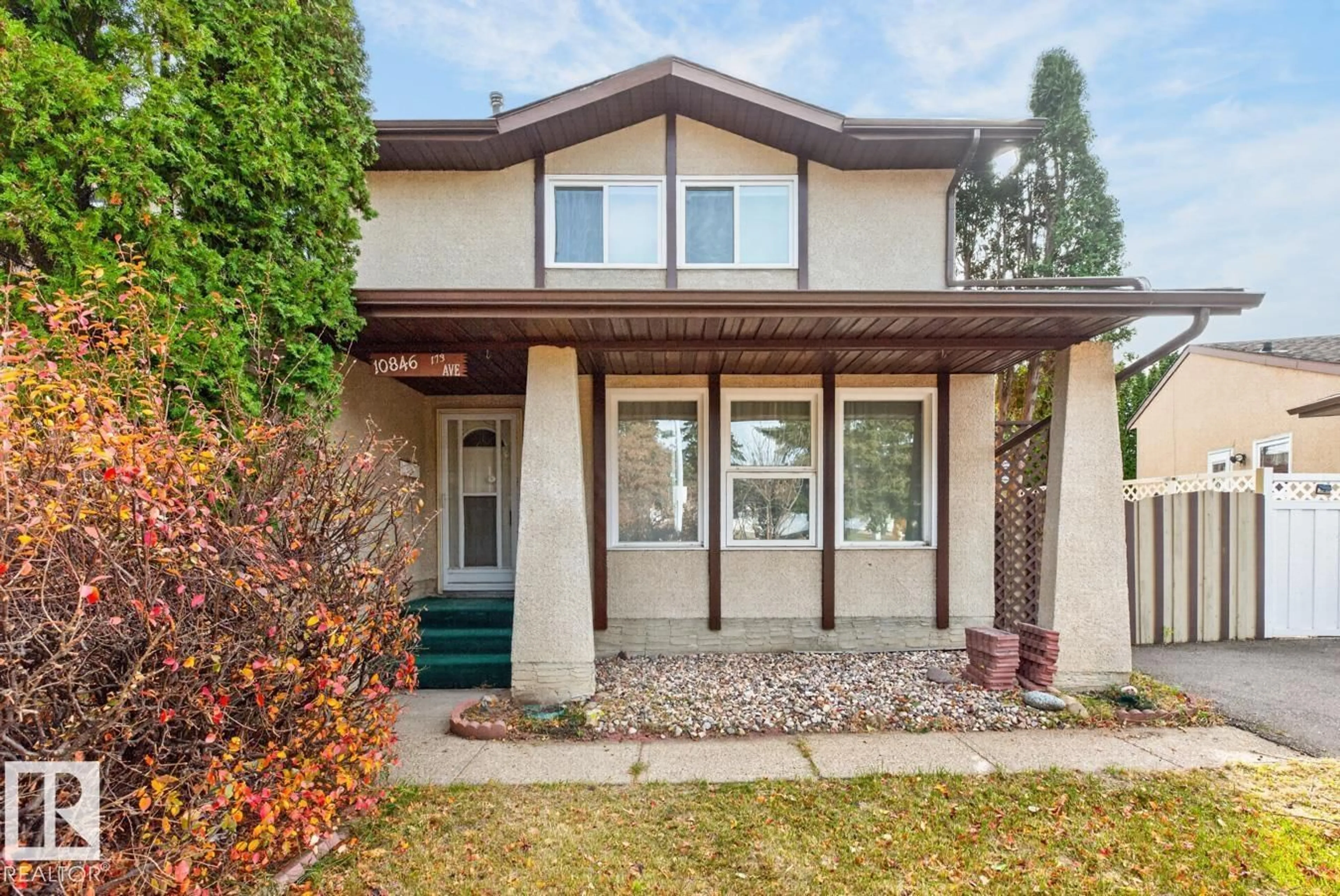Home with vinyl exterior material, street for 10846 173 AV, Edmonton Alberta T5X3Z4