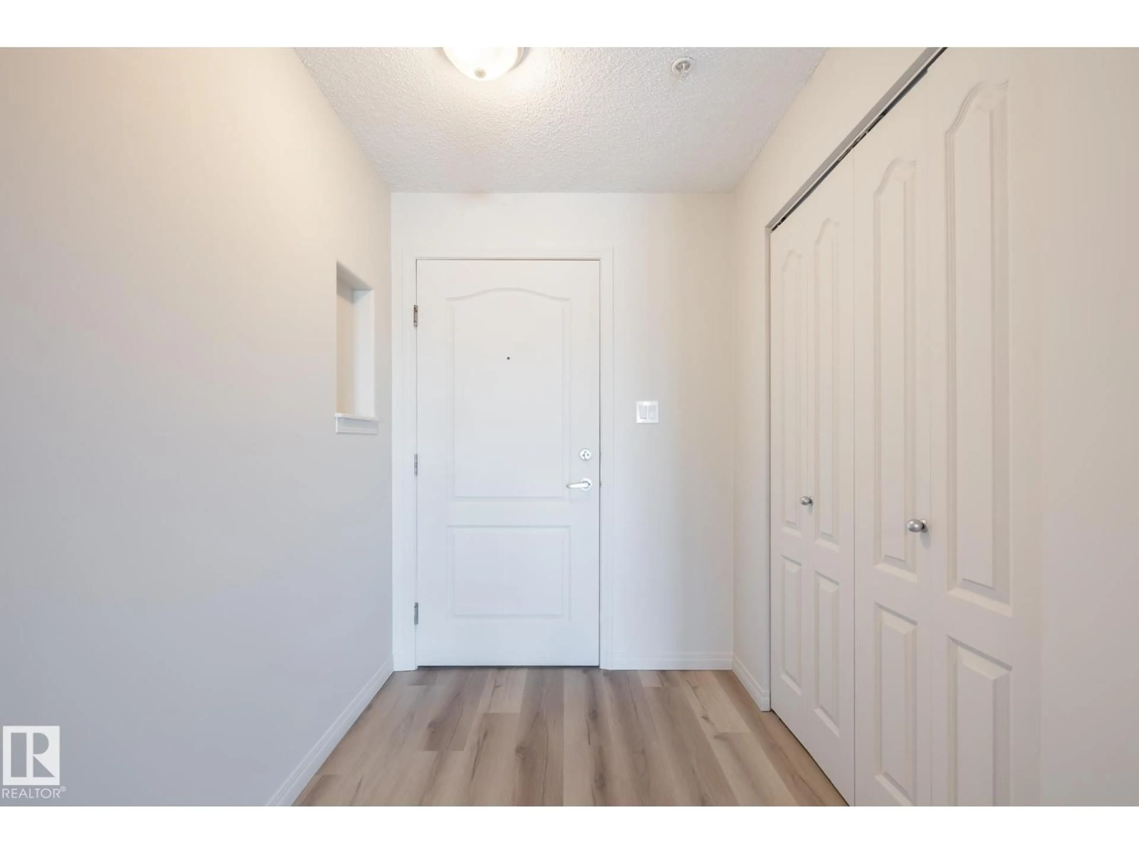 Indoor entryway for #317 - 3425 19 ST, Edmonton Alberta T6T2B5