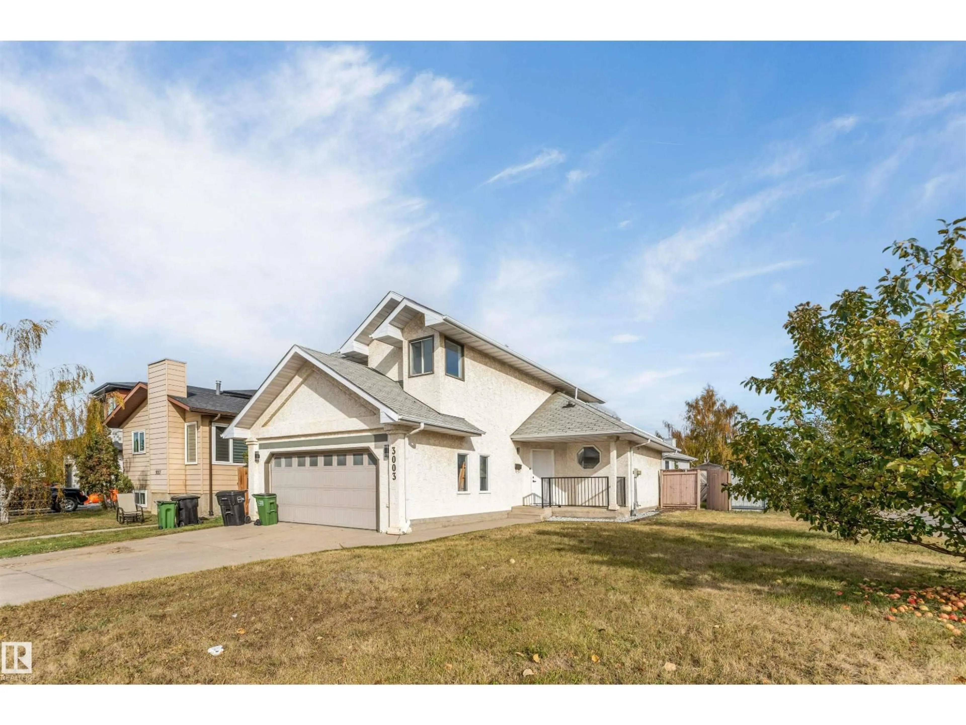 Home with vinyl exterior material, street for NW - 3003 36 ST, Edmonton Alberta T6L4N5