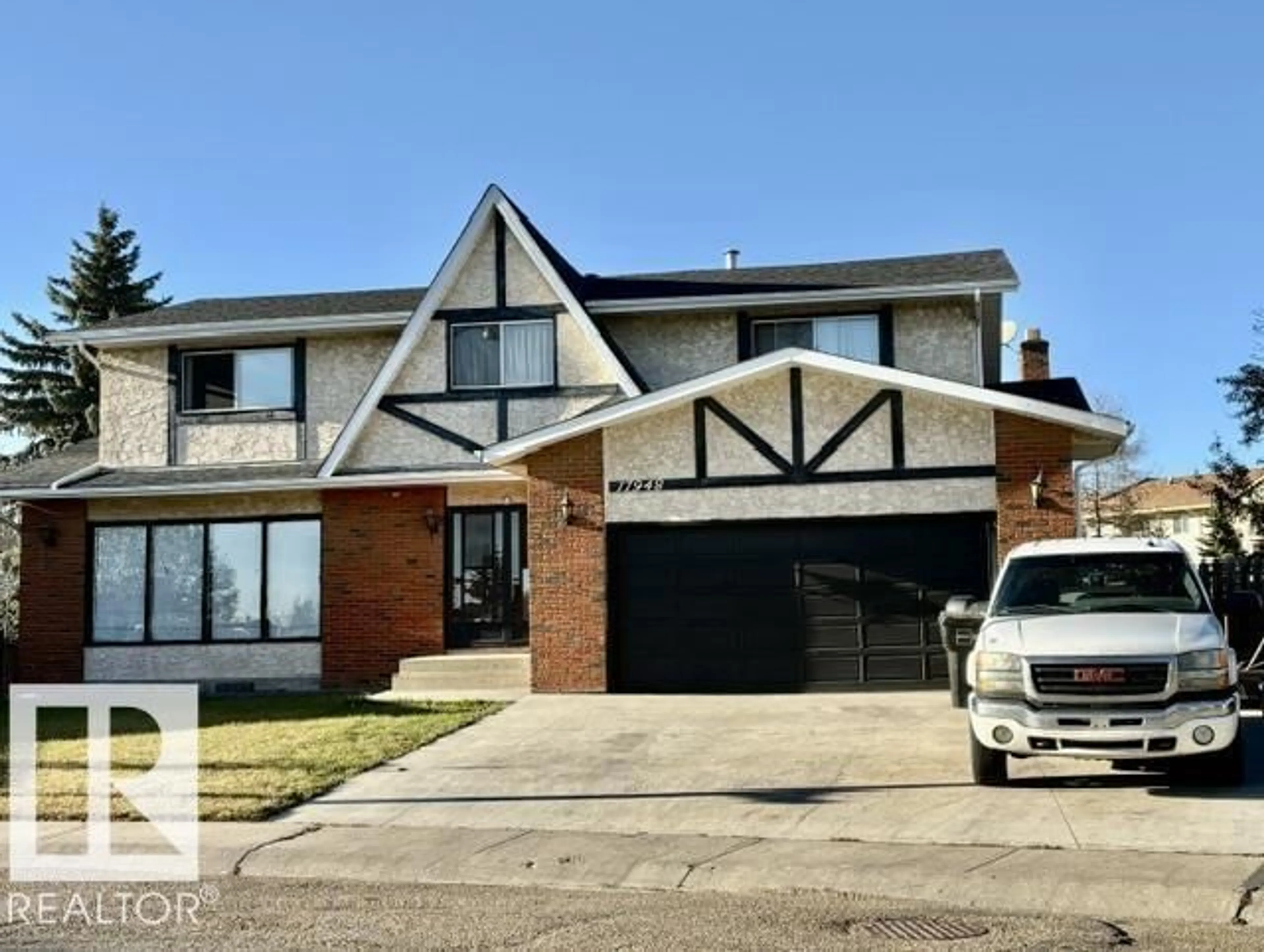 Home with vinyl exterior material, street for 17948 94 AV, Edmonton Alberta T5T1Y2