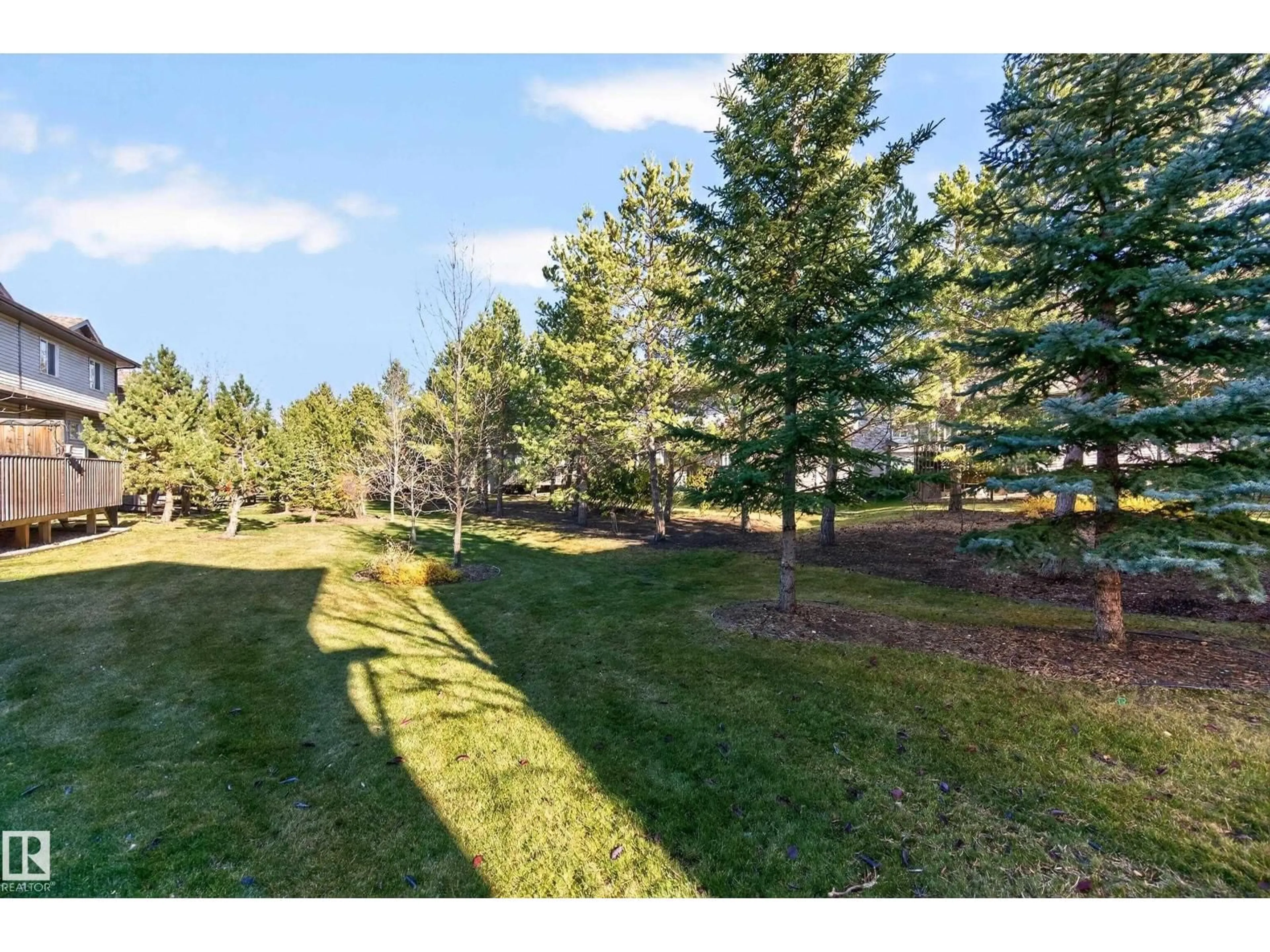 A pic from outside/outdoor area/front of a property/back of a property/a pic from drone, forest/trees view for 404 41 SUMMERWOOD BV, Sherwood Park Alberta T8H0C8