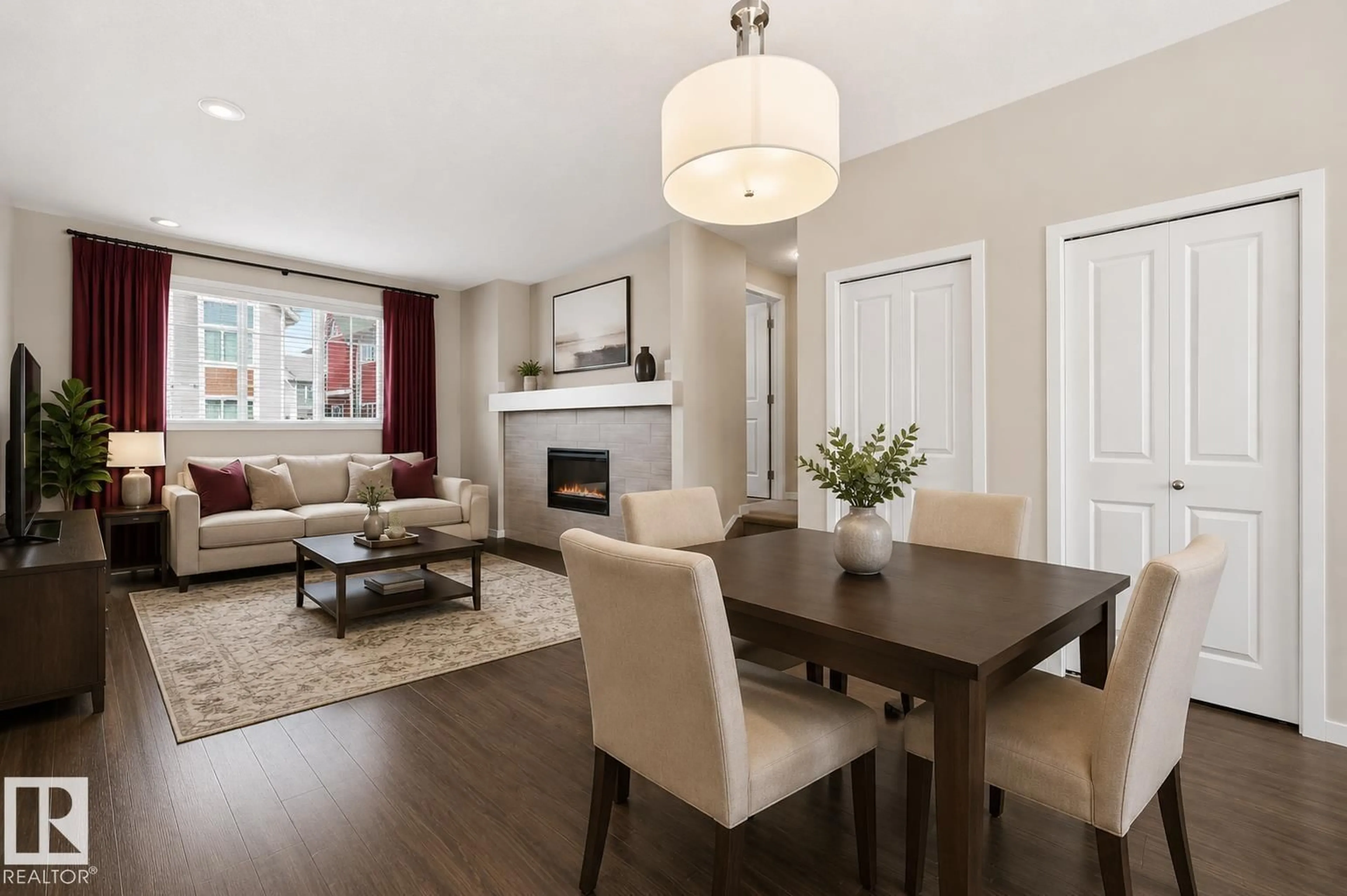 Living room with furniture, wood/laminate floor for #4 - 320 SECORD BV, Edmonton Alberta T5T7E8