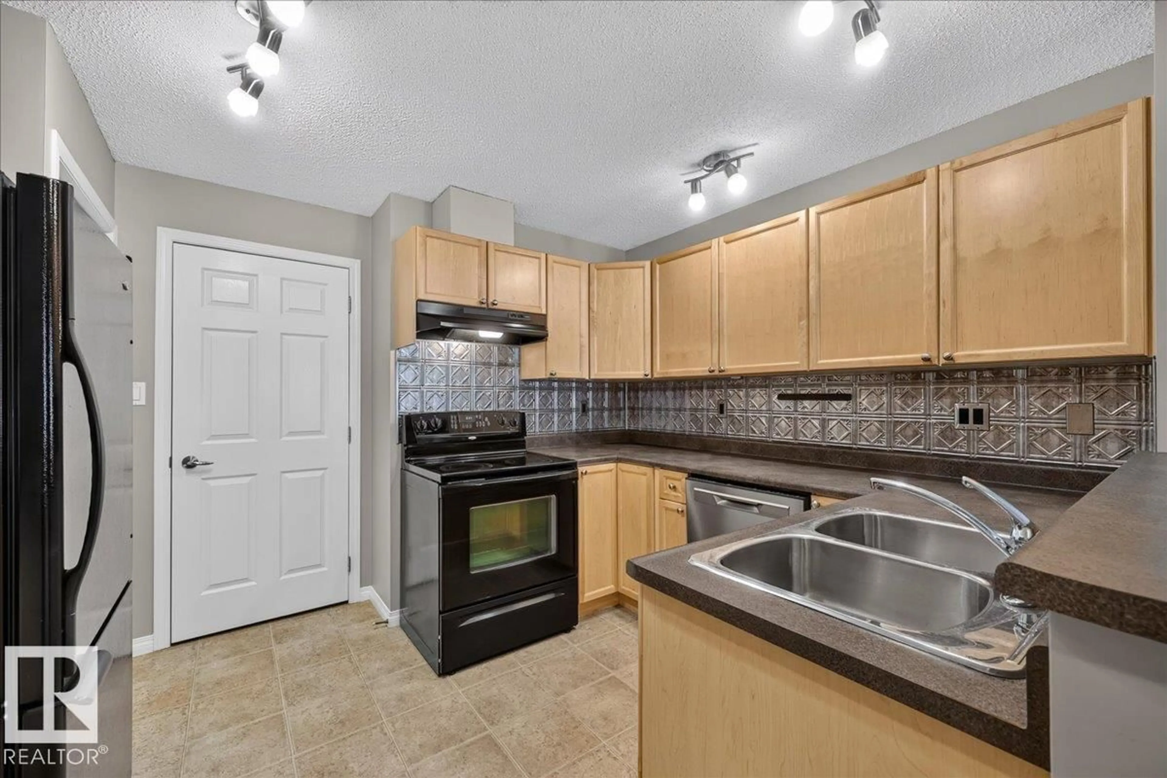 Standard kitchen, ceramic/tile floor for #67 - 3040 SPENCE WD, Edmonton Alberta T6X1N7