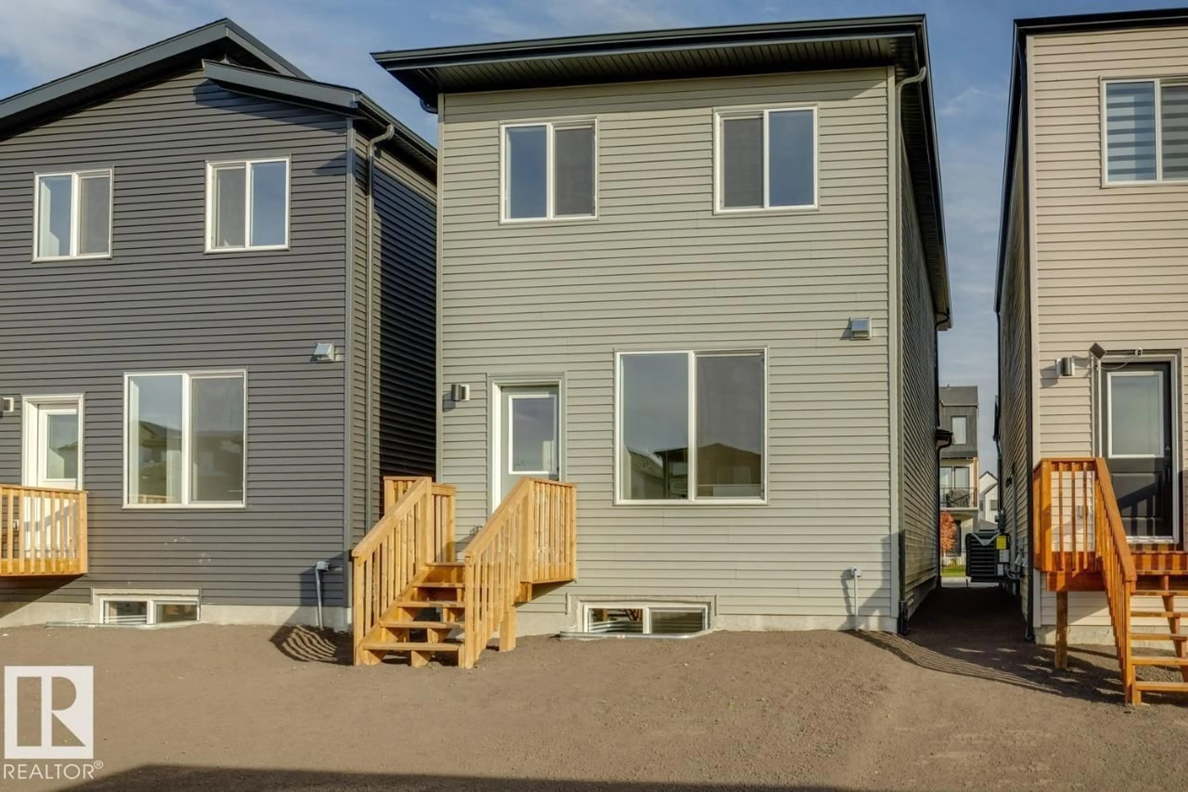 Home with vinyl exterior material, street for SW - 7530 KLAPSTEIN LI, Edmonton Alberta T6W5T2