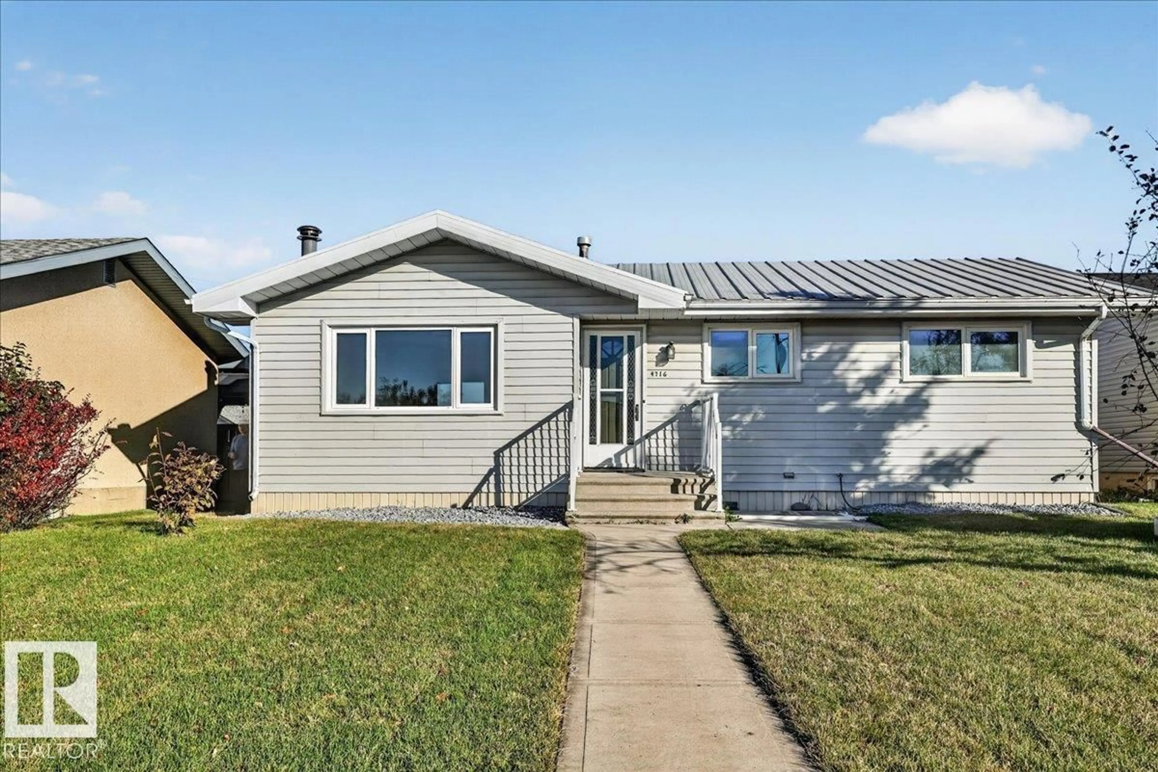 Home with vinyl exterior material, street for 4716 51 AV, Gibbons Alberta T0A1N0