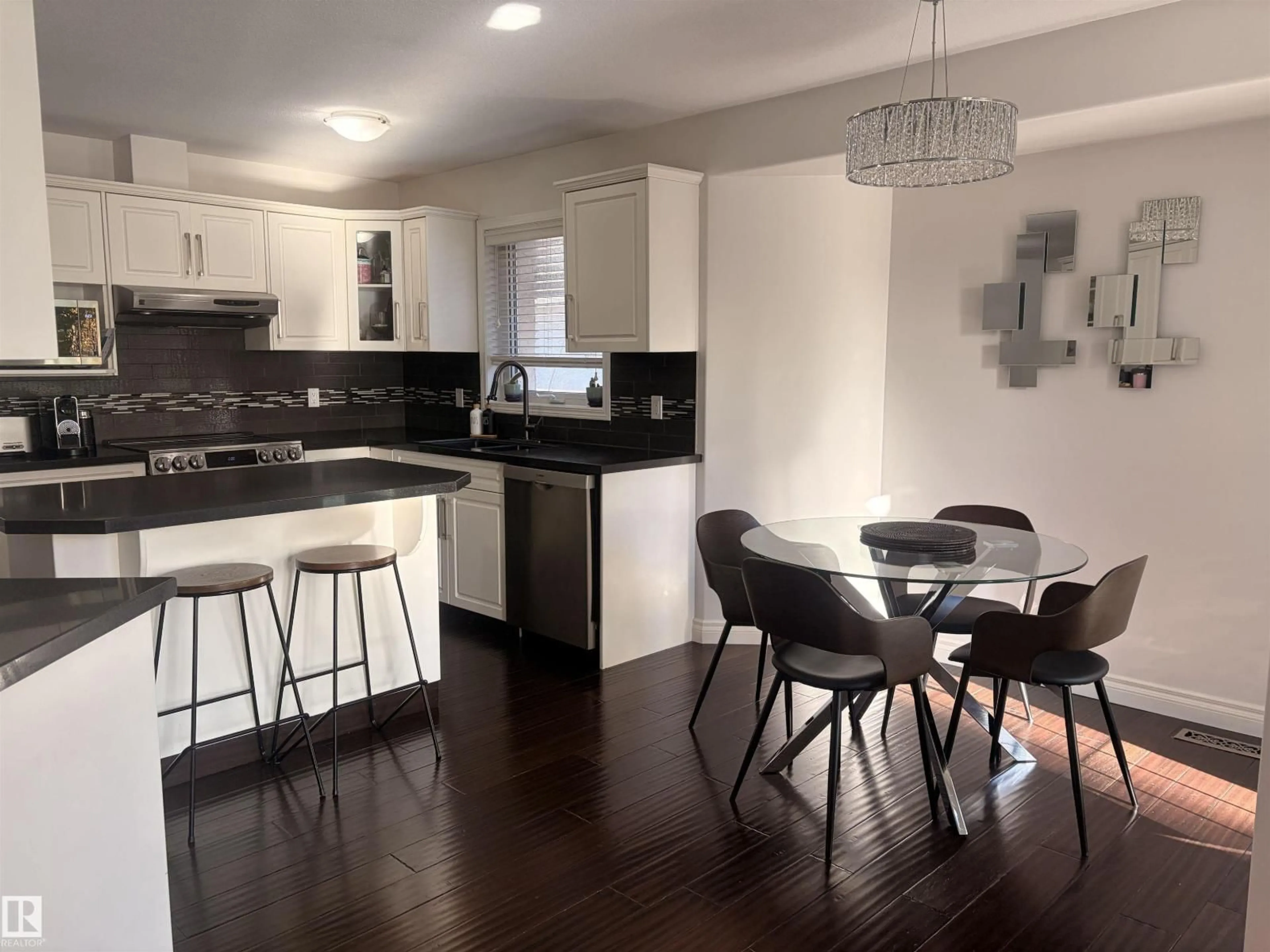 Open concept kitchen, wood/laminate floor for 37 EVEREST CR, St. Albert Alberta T8N6L1