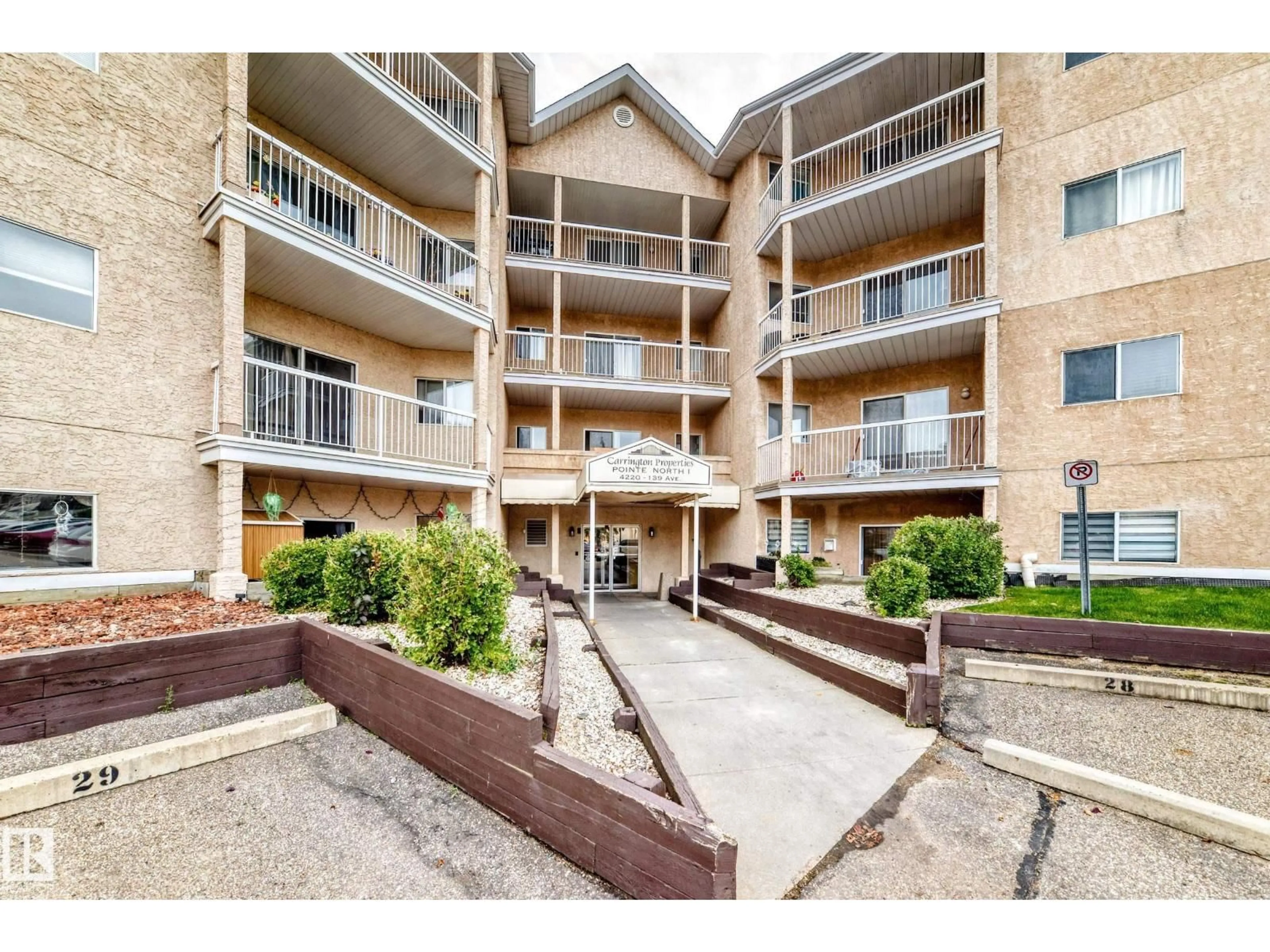 Patio, street for #201 - 4220 139 AV, Edmonton Alberta T5Y2Y2