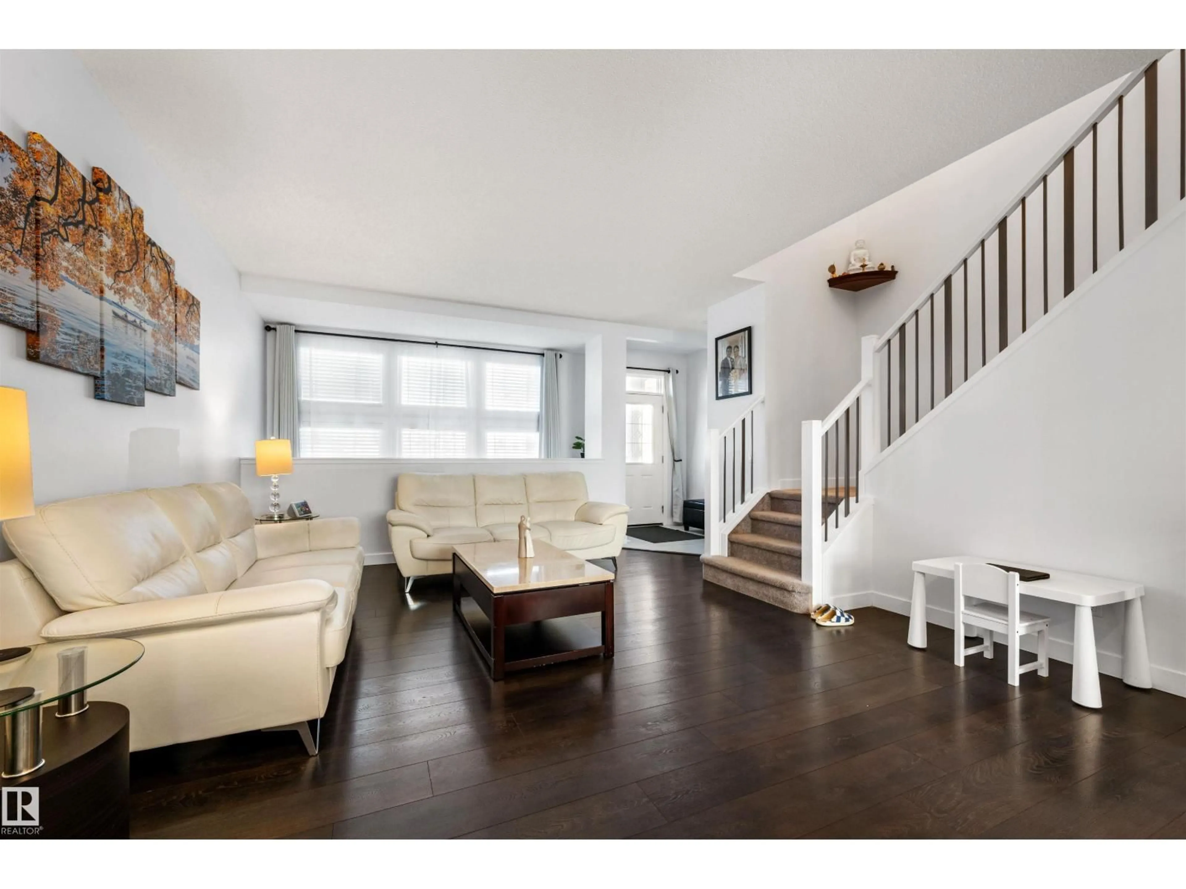Living room with furniture, wood/laminate floor for SW - 2809 ANTON WD, Edmonton Alberta T6W4B1