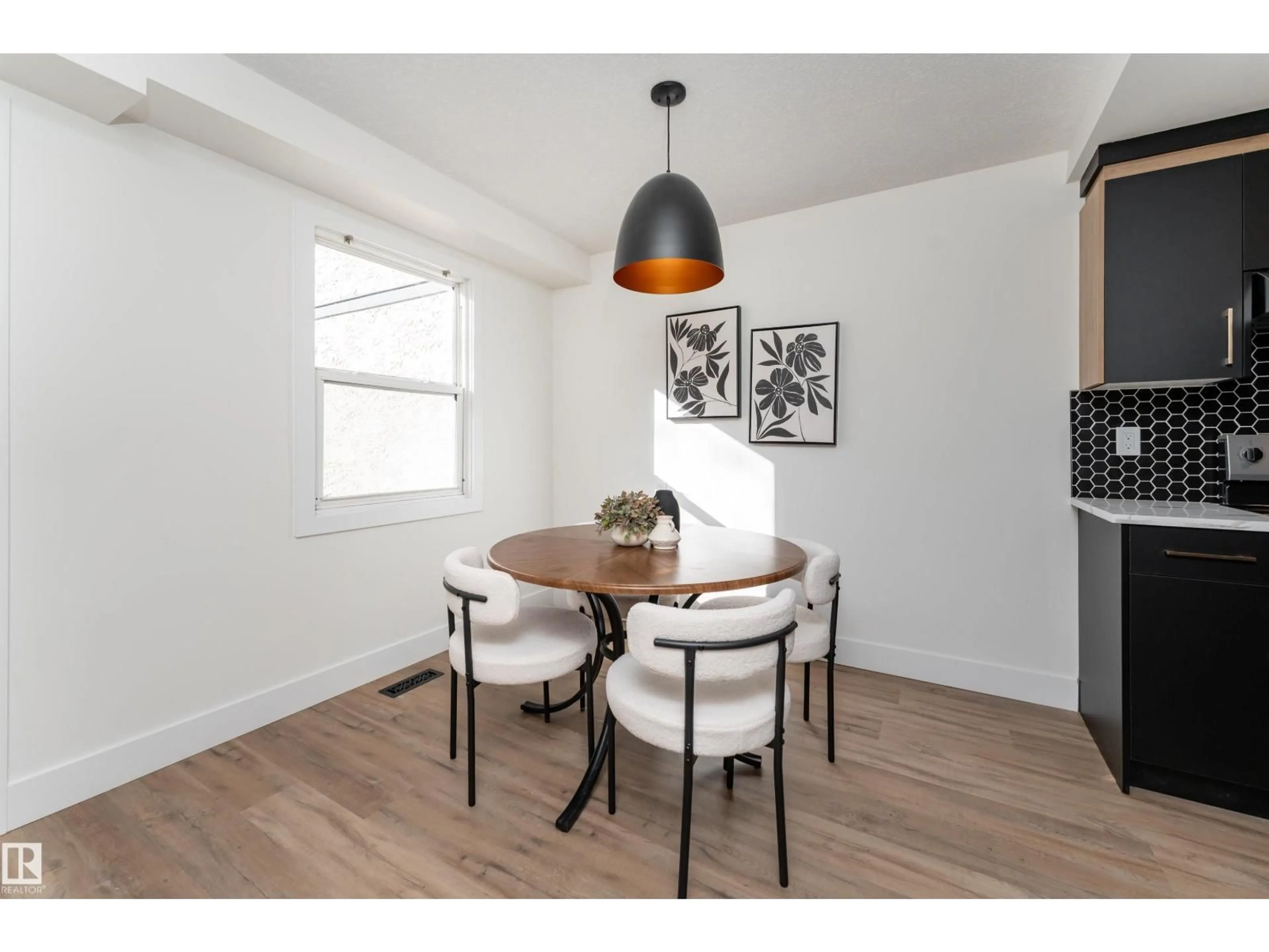 Dining room, wood/laminate floor for 193a HOMESTEAD CR, Edmonton Alberta T5A2Y2