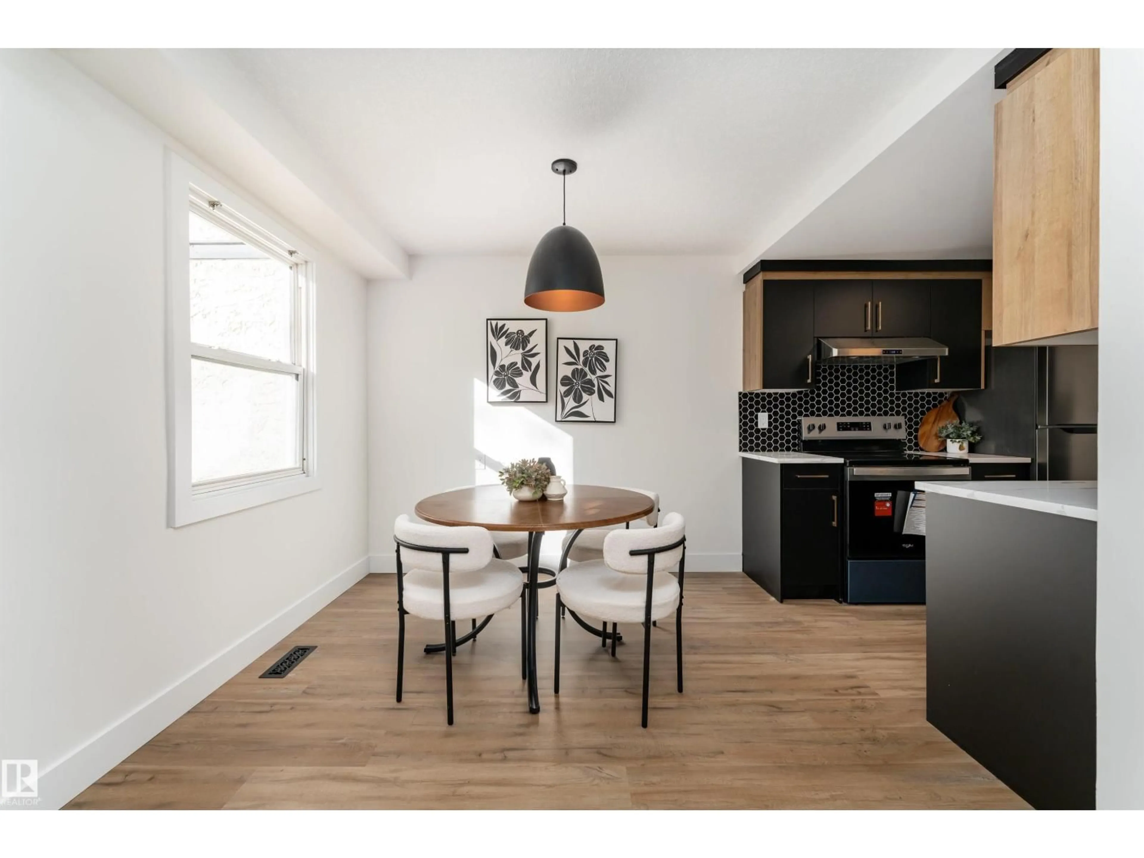 Open concept kitchen, wood/laminate floor for 193a HOMESTEAD CR, Edmonton Alberta T5A2Y2