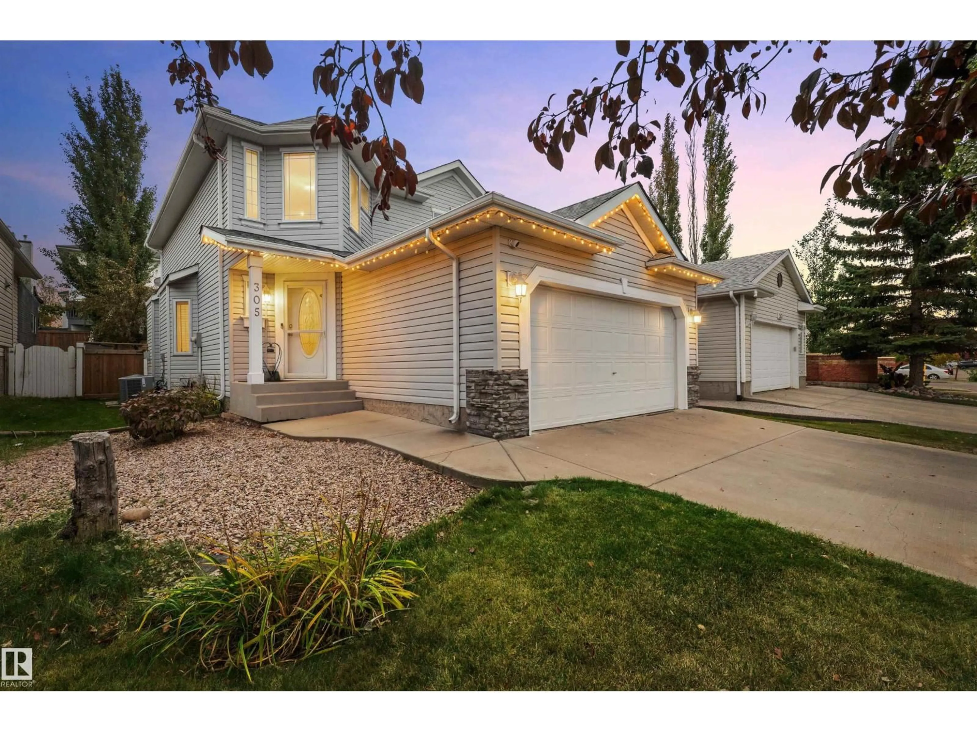 Home with vinyl exterior material, street for 305 WILD ROSE WY, Edmonton Alberta T6T1M7