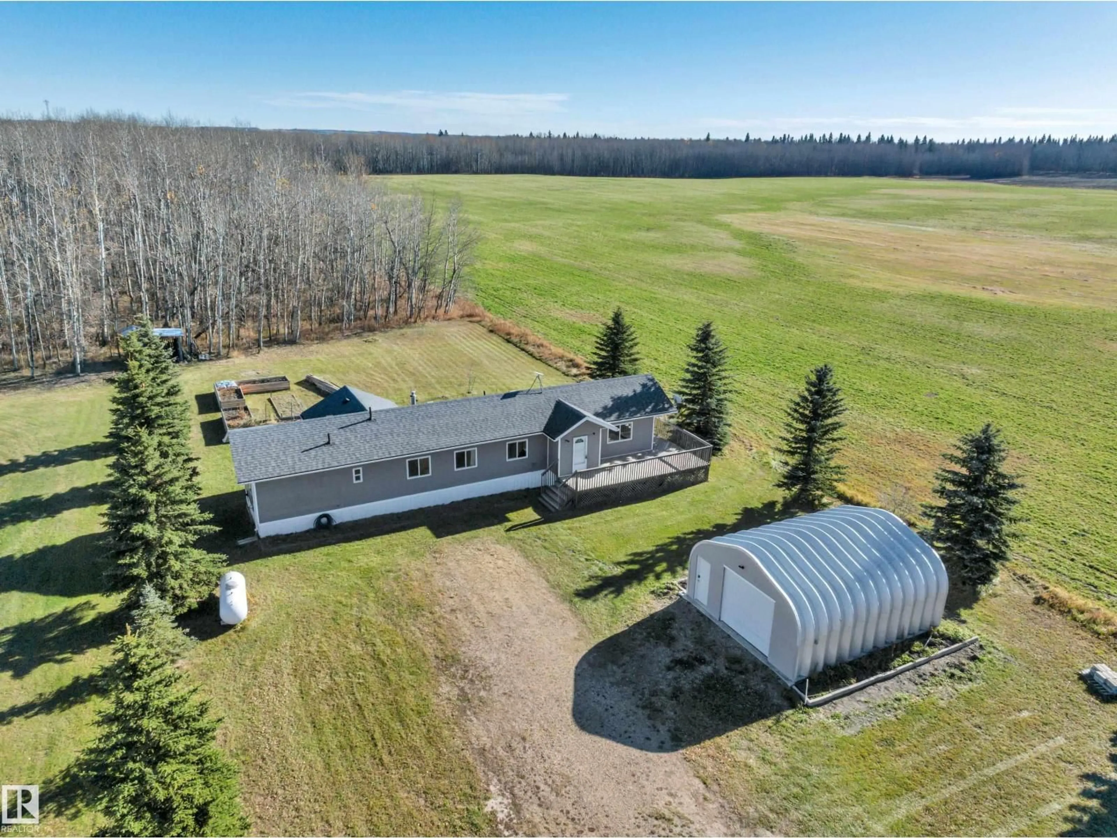 A pic from outside/outdoor area/front of a property/back of a property/a pic from drone, building for 461063 RGE ROAD 10, Rural Wetaskiwin County Alberta T0C2V0