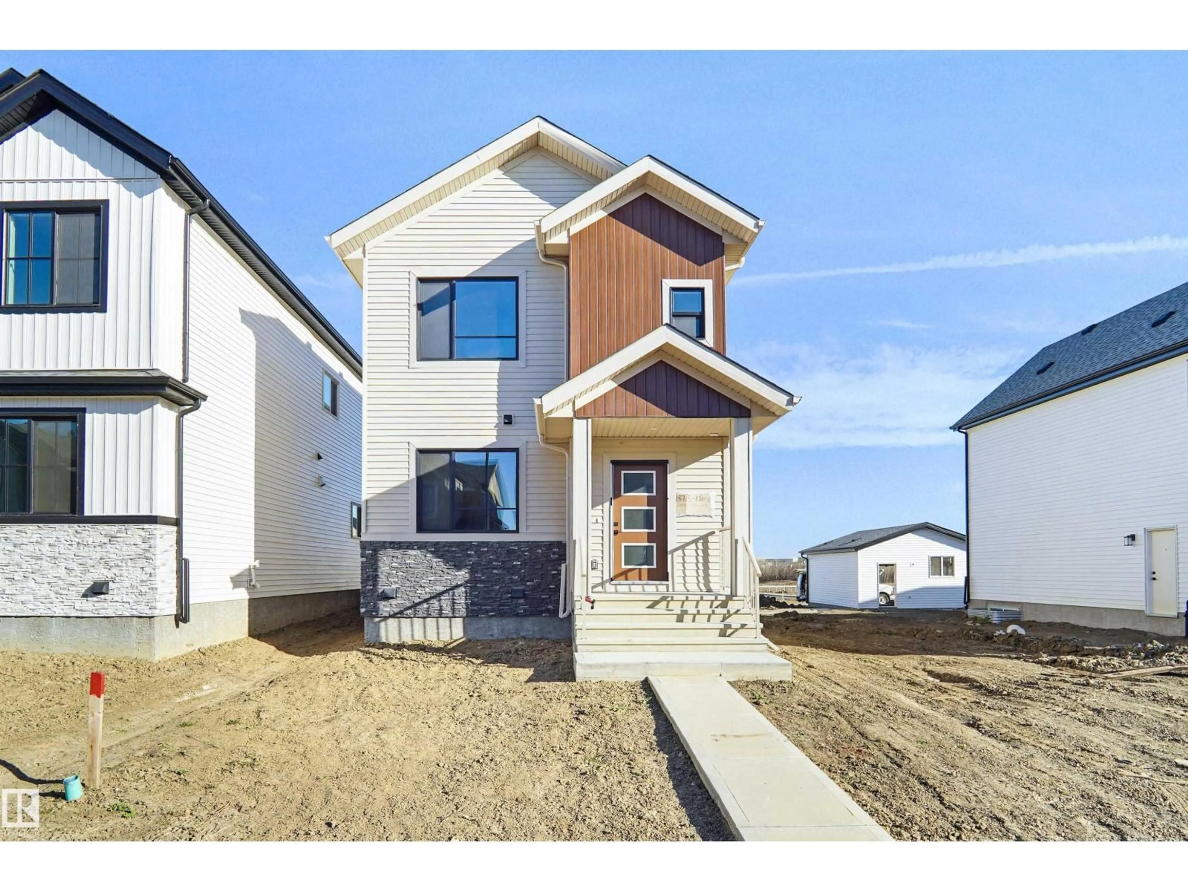 Home with vinyl exterior material, street for NW - 18715 130 ST, Edmonton Alberta T6V0P2