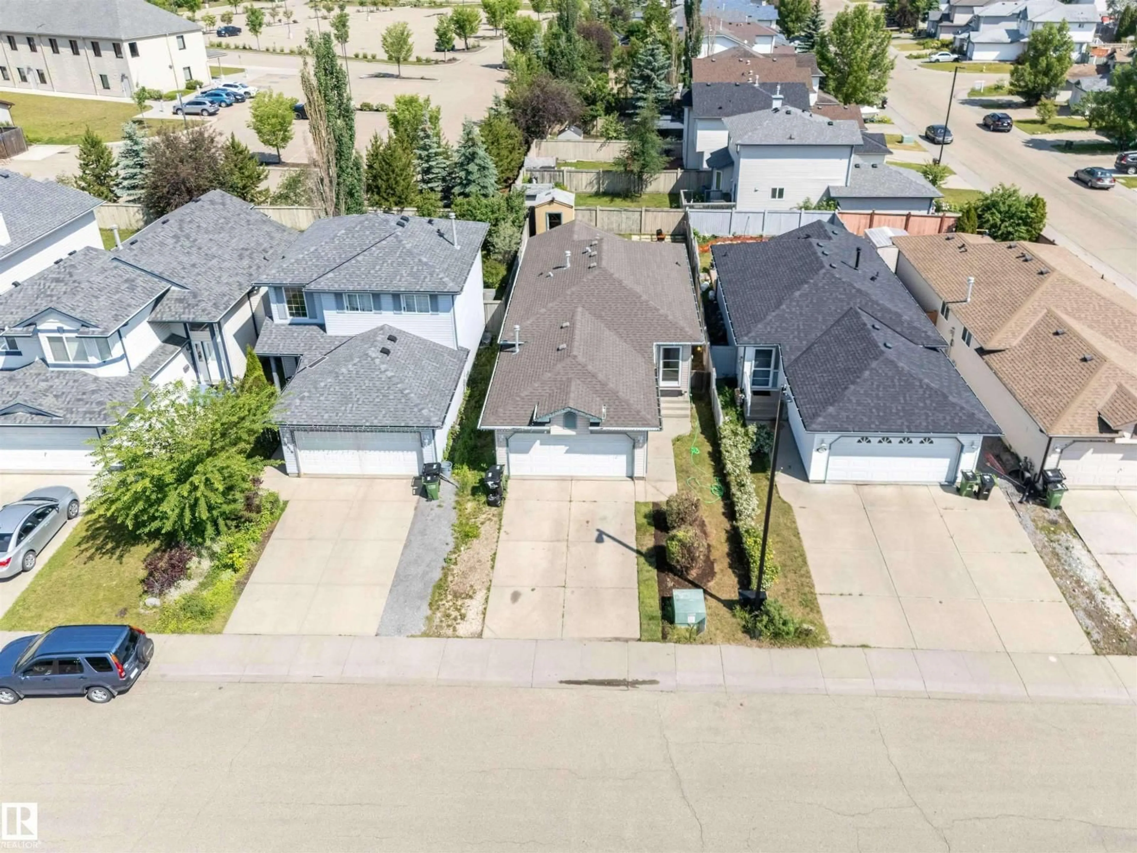 A pic from outside/outdoor area/front of a property/back of a property/a pic from drone, street for 3312 27 AVE, Edmonton Alberta T6T1P7