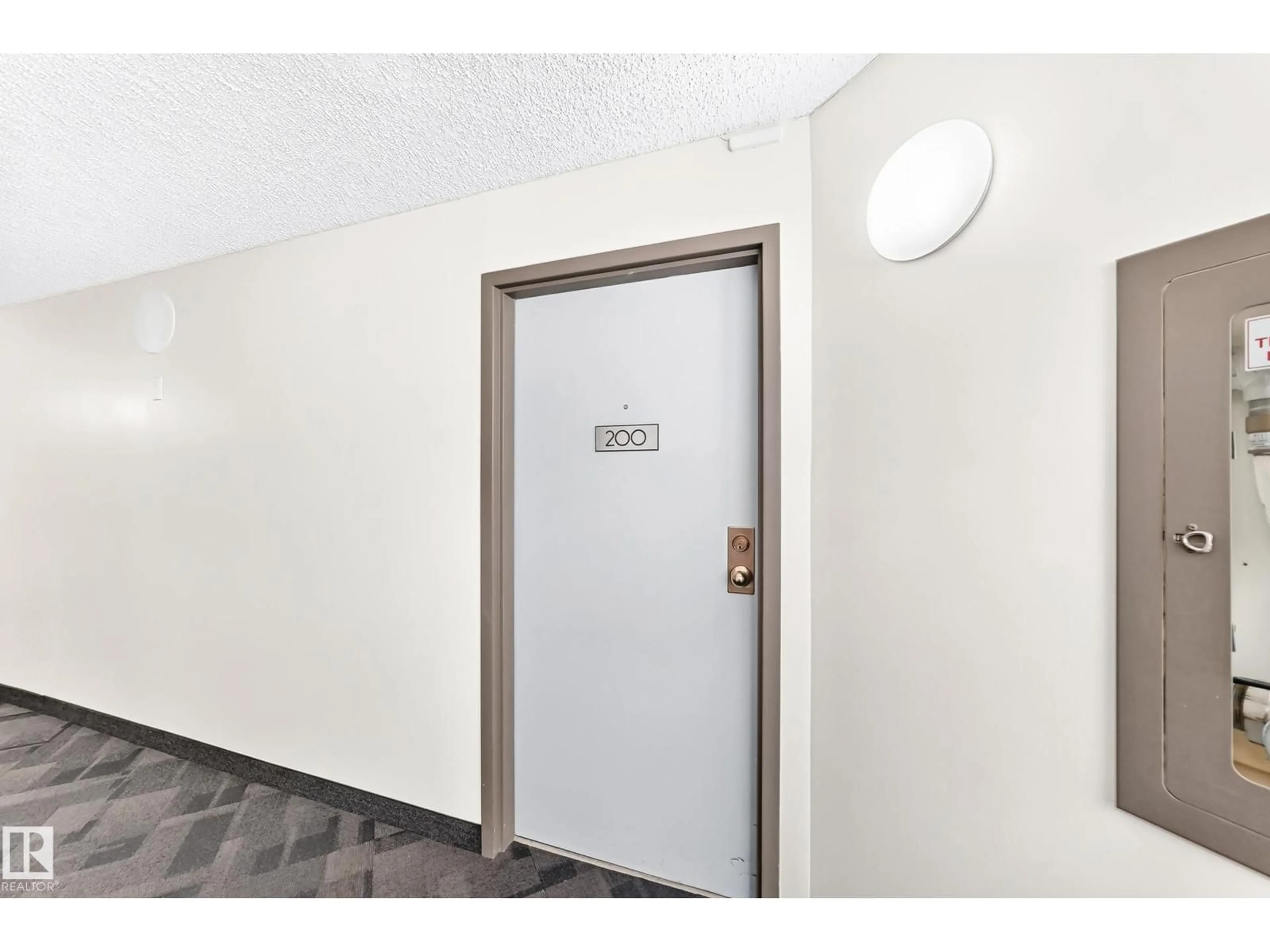Indoor foyer for #200 - 10149 SASKATCHEWAN DR NW, Edmonton Alberta T6E6B6